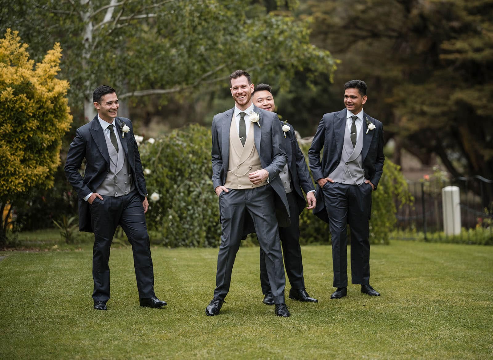 the manor basket range wedding - cassie & danny 11 Laughing groomsmen on grass