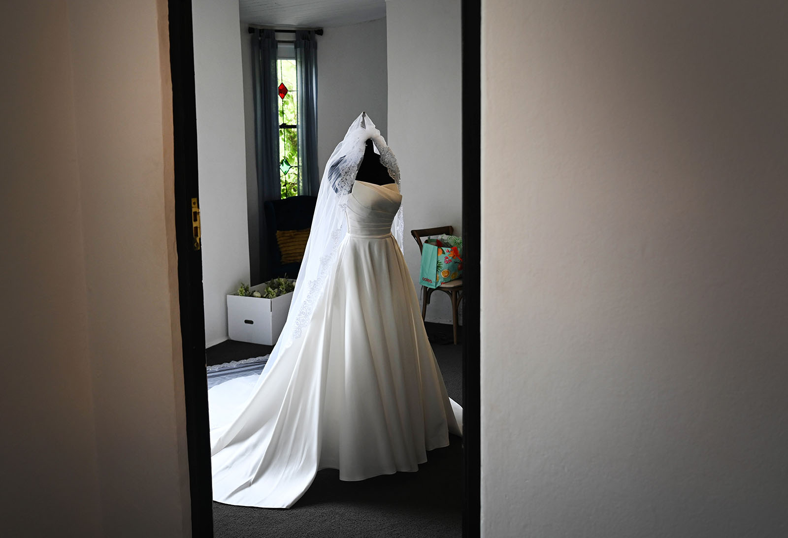 the manor basket range wedding - cassie & danny 14 Wedding dress on mannequin