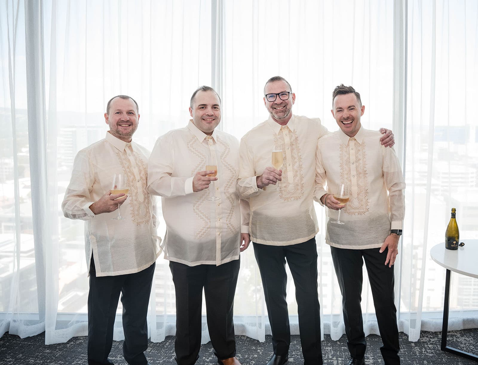 st francis xaviers cathedral wedding - sash & dan 19 Groomsmen together holding glass