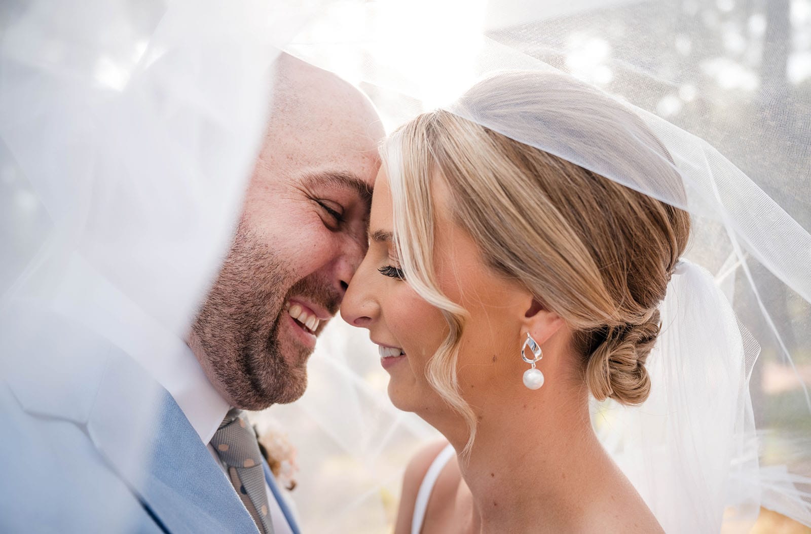 house on haines wedding - danieka & jack 54 bridal couple under veil together