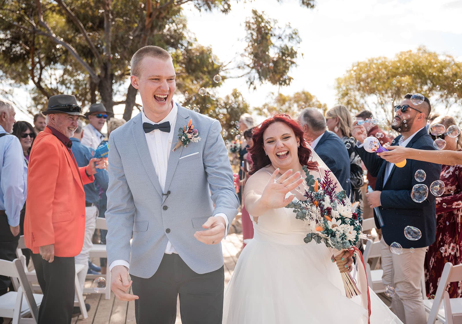 riverland wine centre wedding - lisa & mitch 197 Bridal exit with bubbles