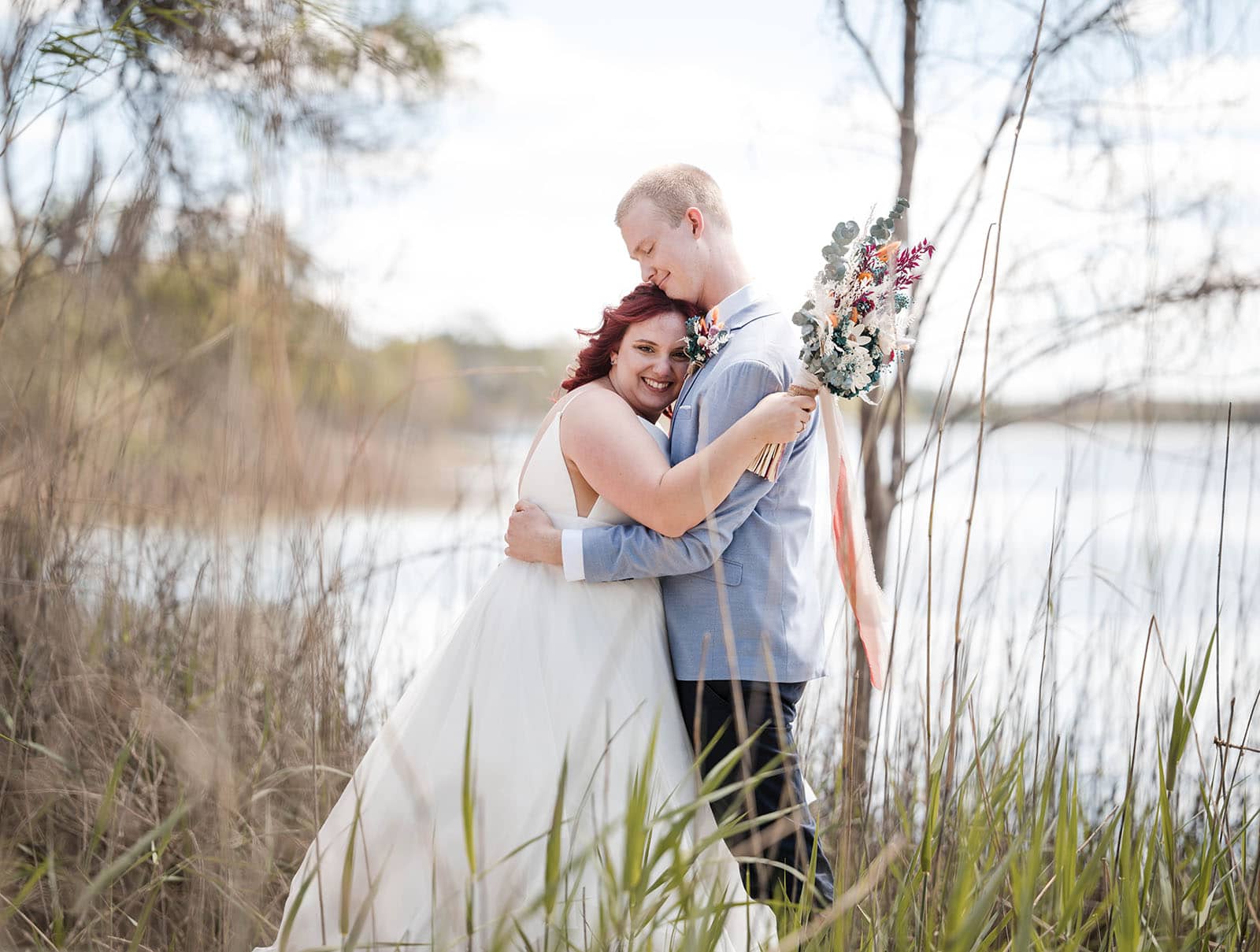 riverland wine centre wedding - lisa & mitch 185 Bridal hugs in long reeds