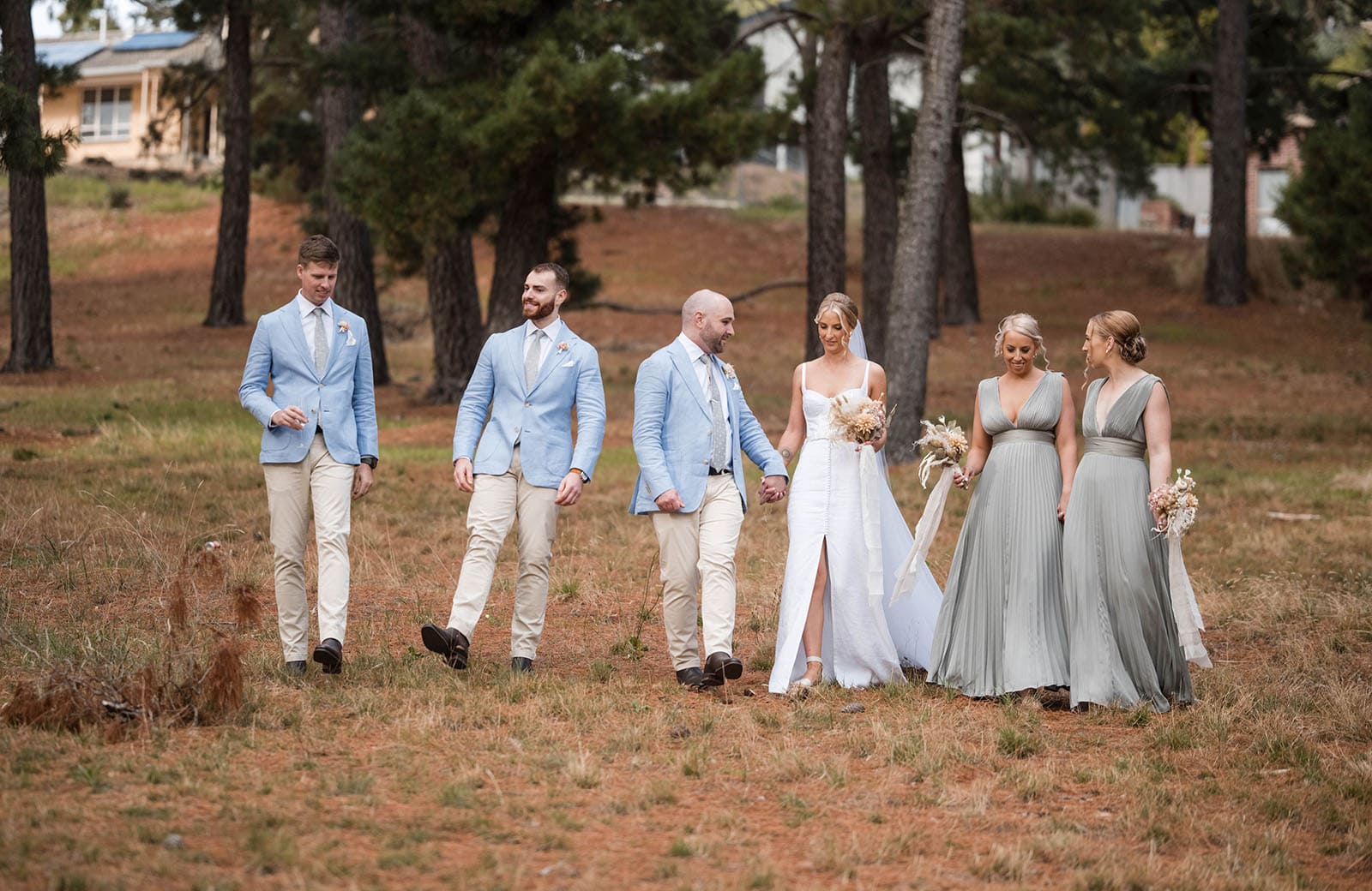 house on haines wedding - danieka & jack 51 Bridal party walking through forest