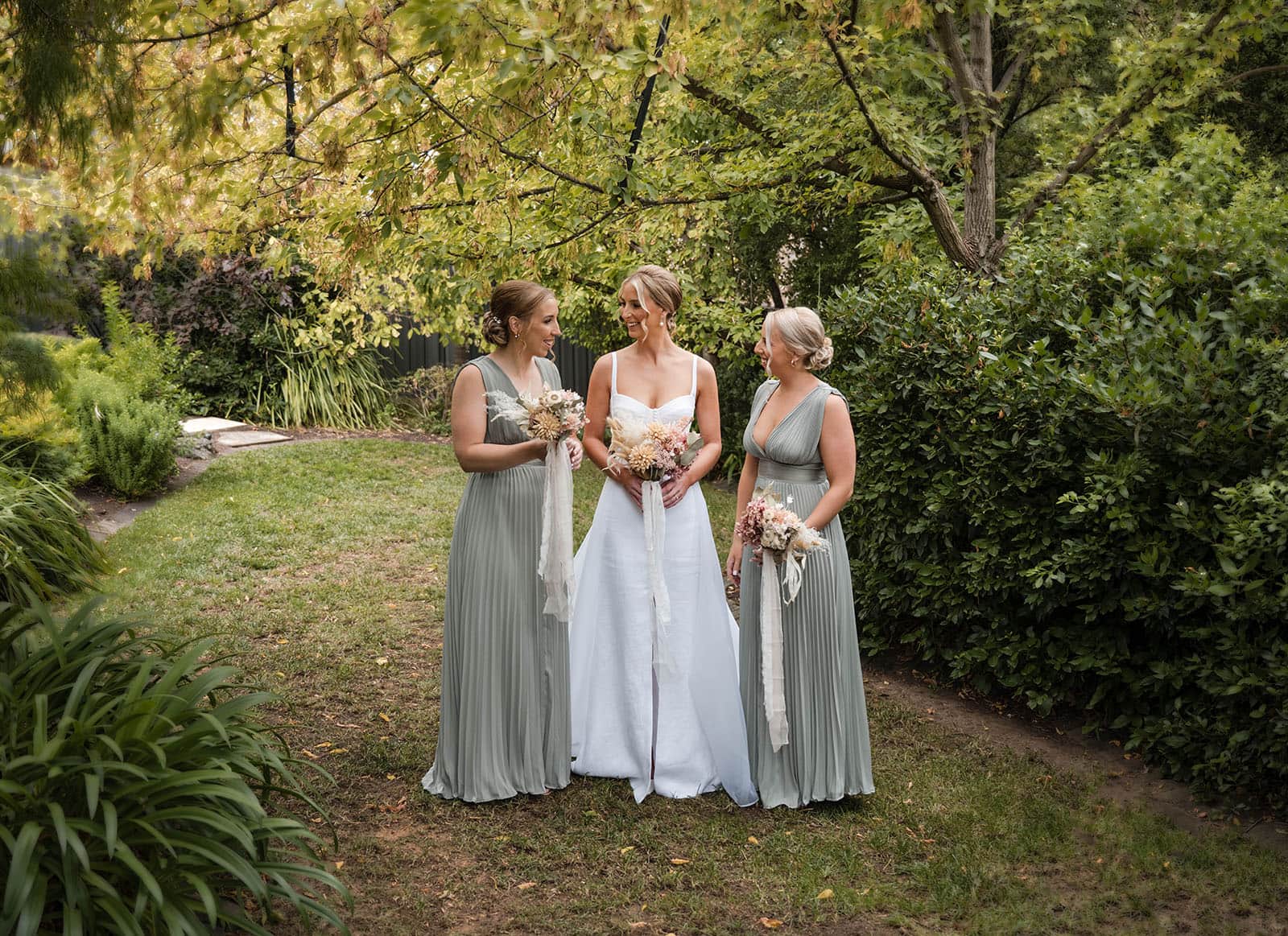 house on haines wedding - danieka & jack 32 Bride and bridesmaids in garden