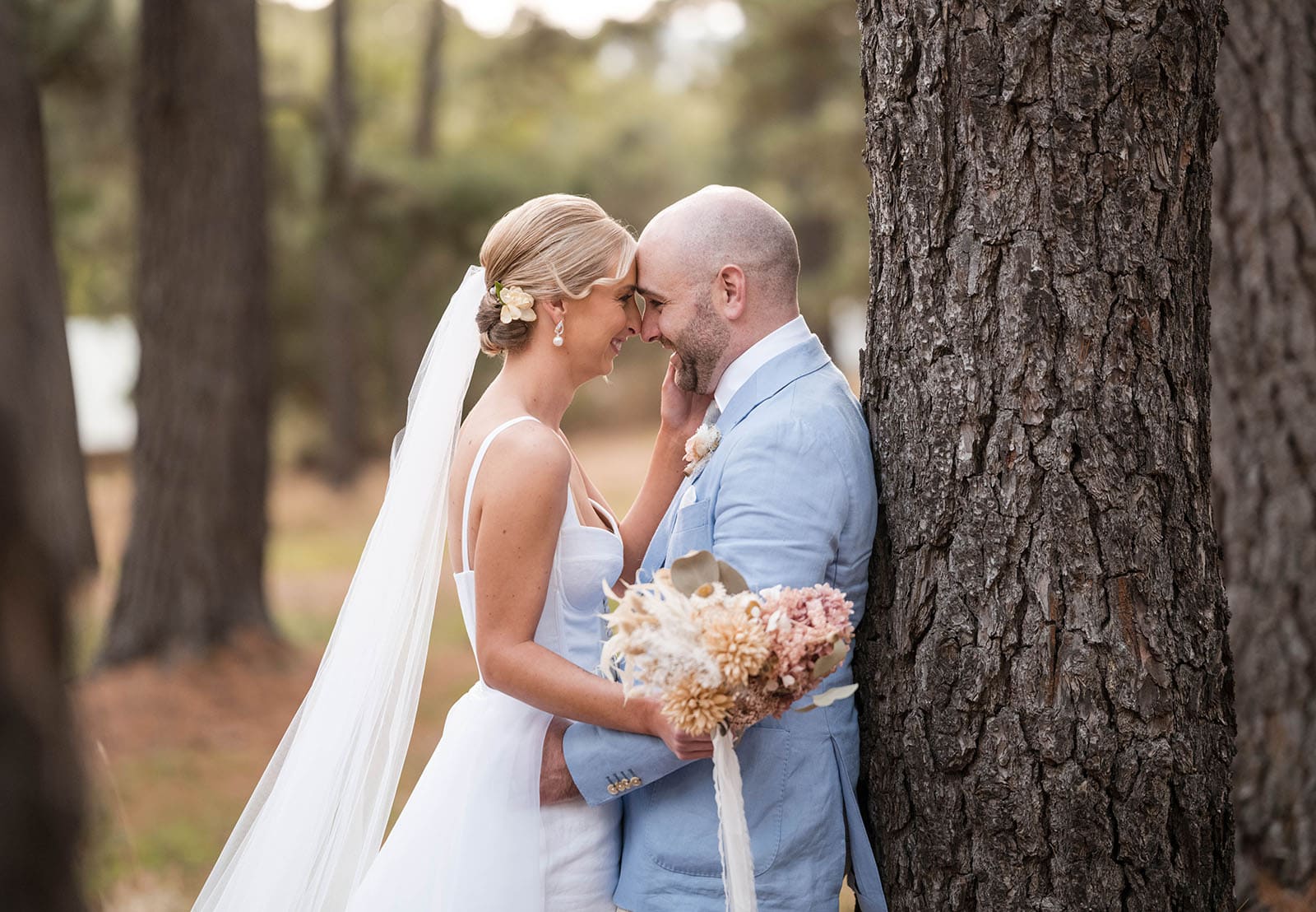 house on haines wedding - danieka & jack 52 Bride and groom head butt on tree