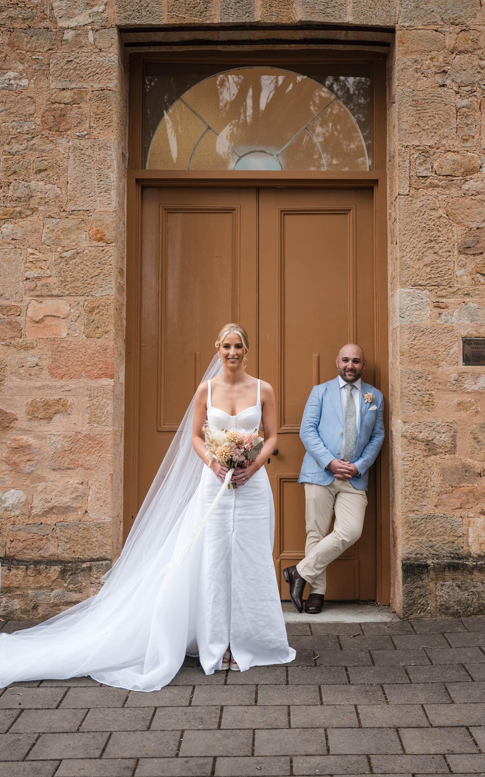 house on haines wedding - danieka & jack 46 bride and groom in wooden door