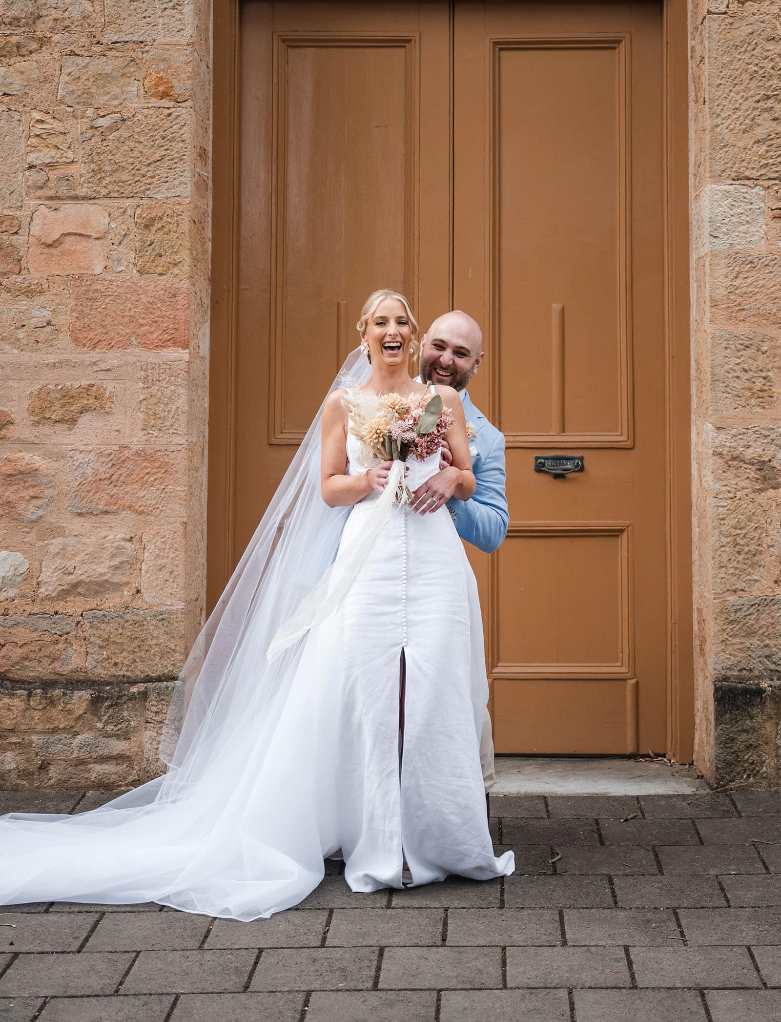 house on haines wedding - danieka & jack 47 bride and groom in wooden doorway
