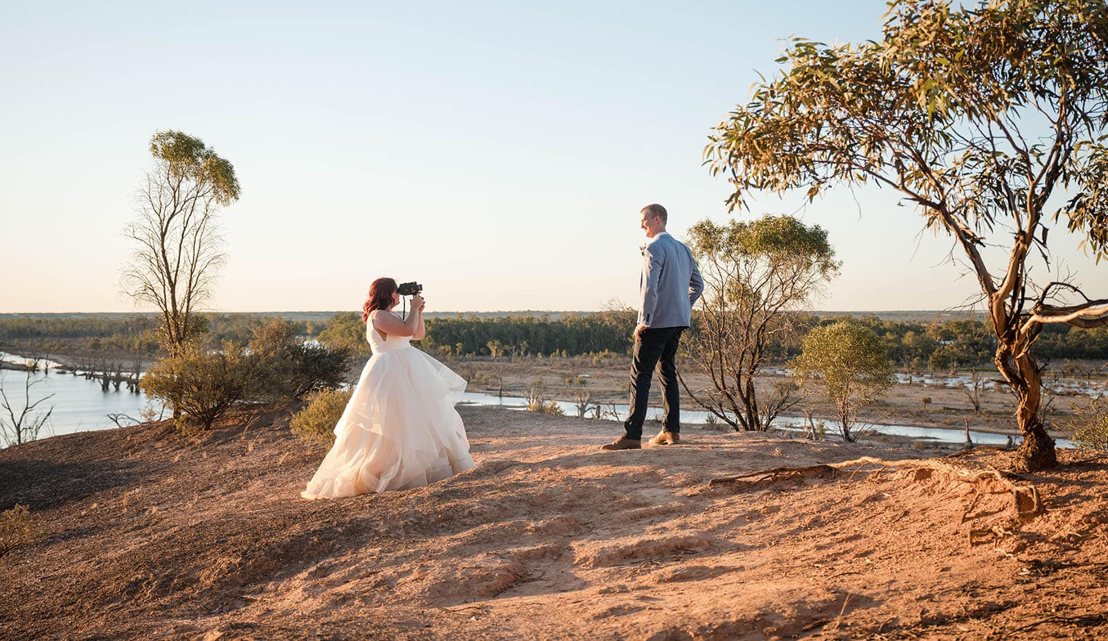 riverland wine centre wedding - lisa & mitch 203 Bride filming groom on super 8 camera