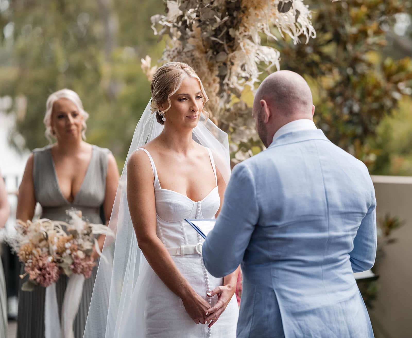 house on haines wedding - danieka & jack 42 Bride looking at her groom during ceremony