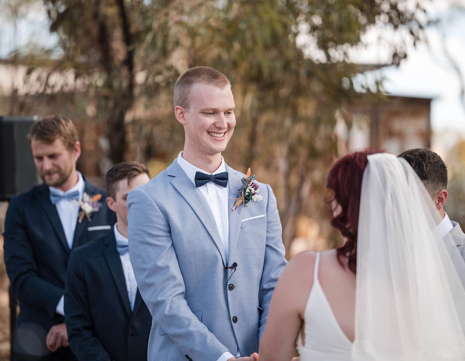 riverland wine centre wedding - lisa & mitch 191 Grinning groom at his ceremony