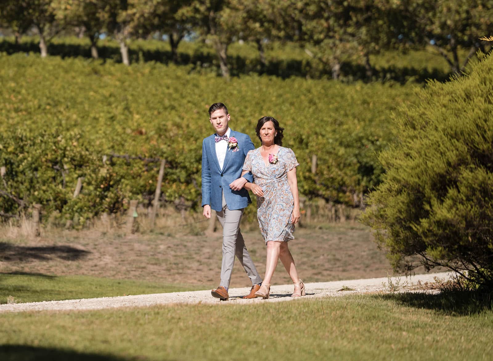 k1 winery wedding - mitch & nick 106 groom approaching wedding ceremony