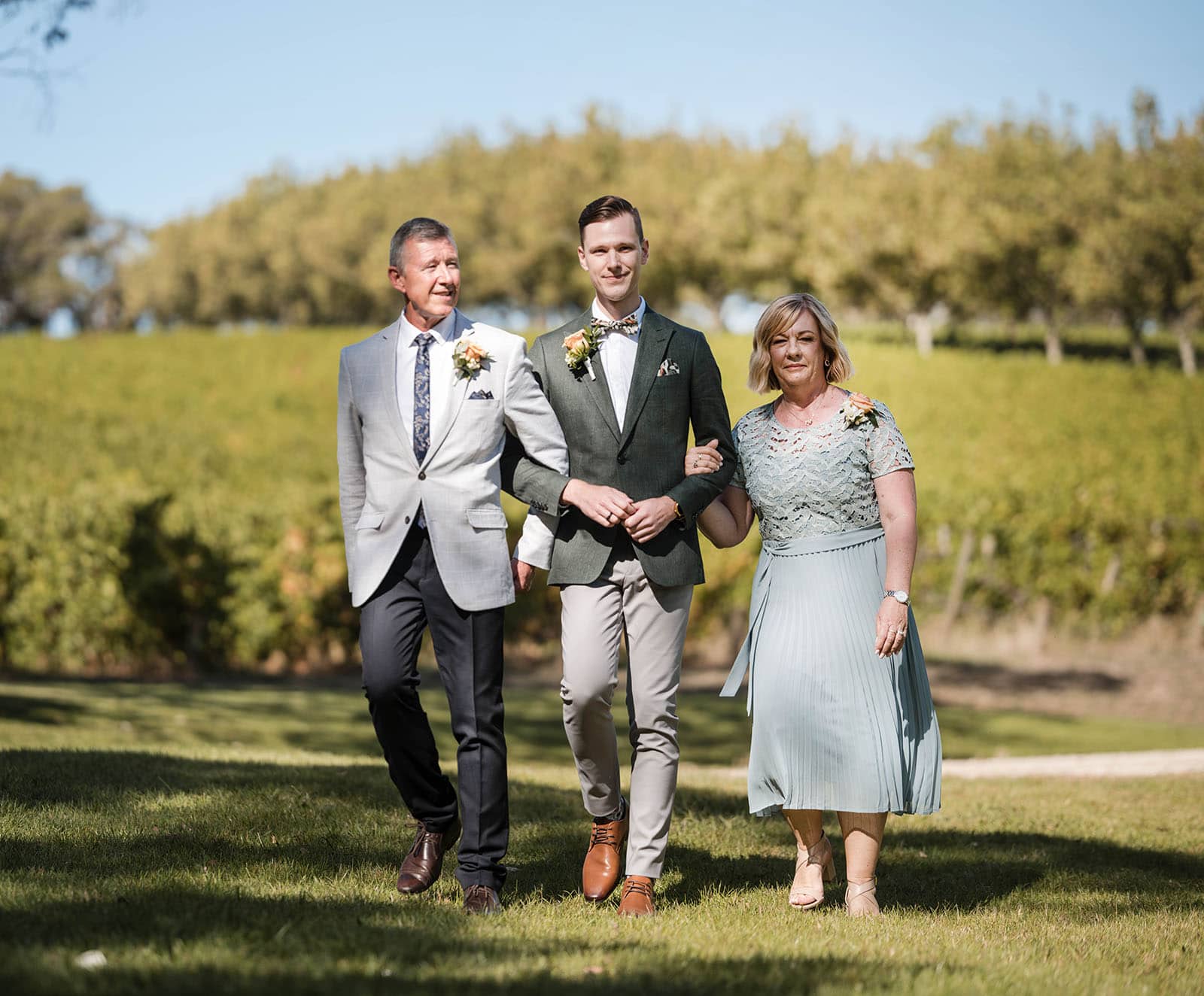 k1 winery wedding - mitch & nick 104 Groom approaching with family