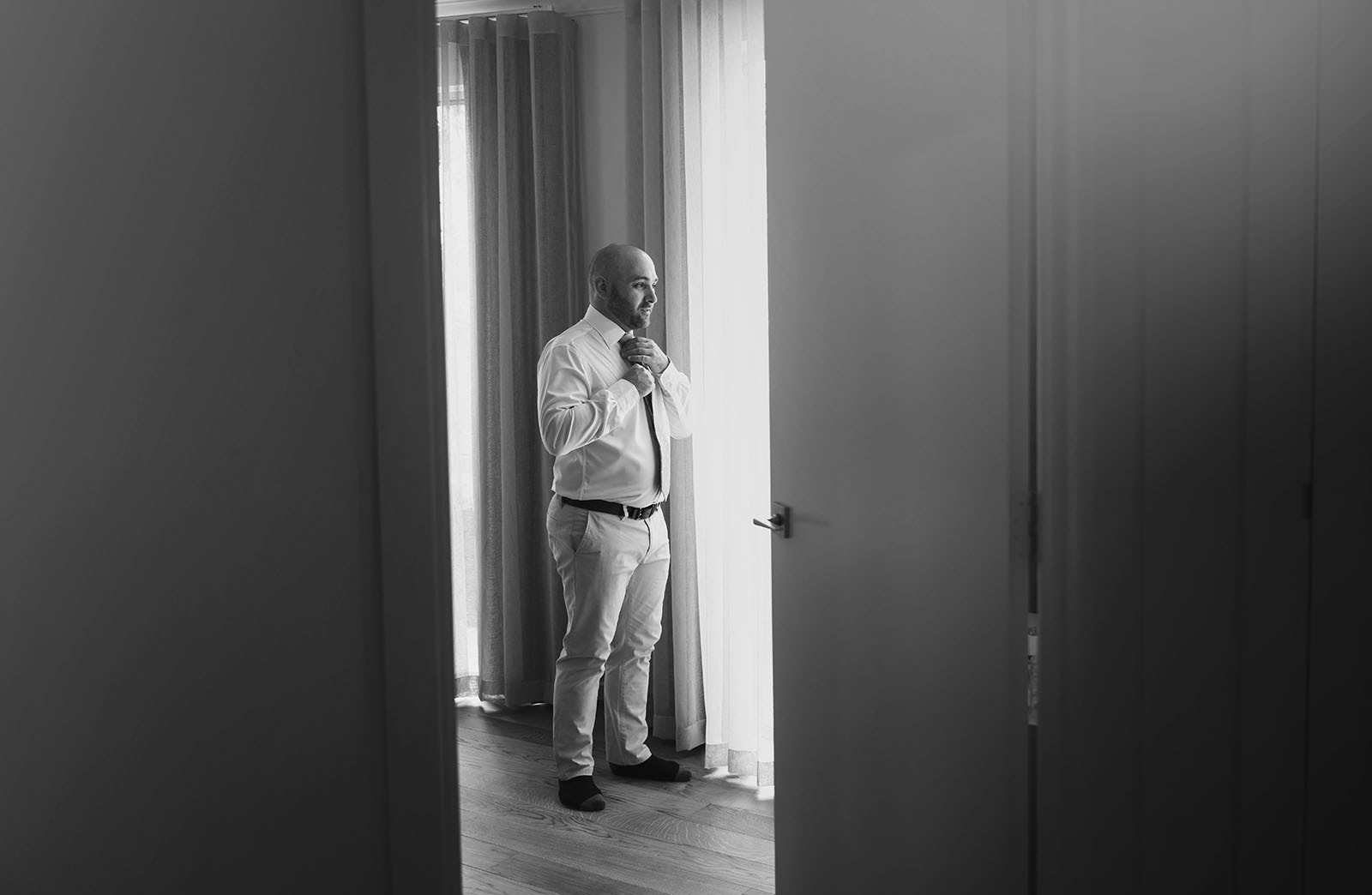 house on haines wedding - danieka & jack 20 Groom through doorway