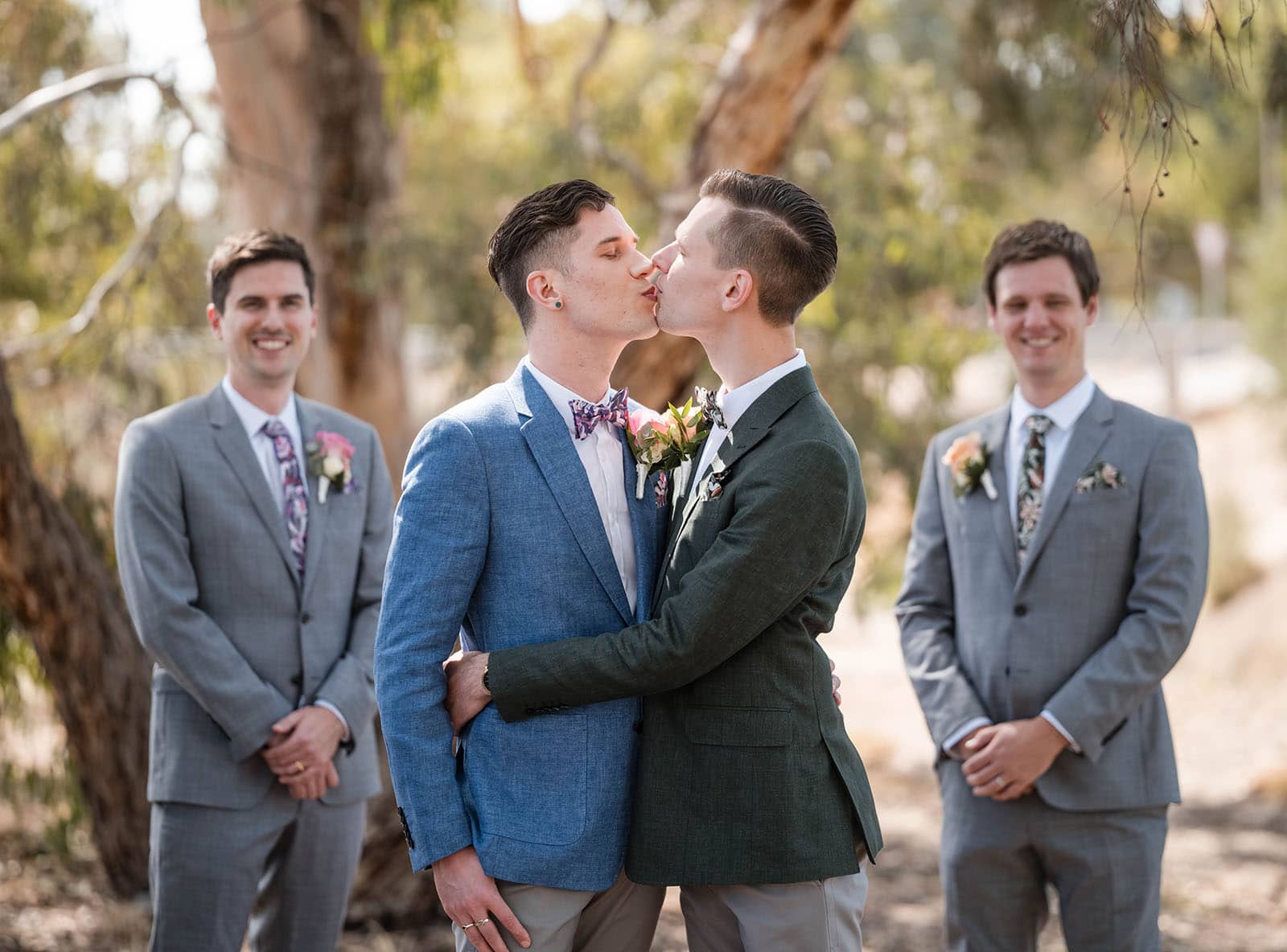 k1 winery wedding - mitch & nick 93 Grooms kissing with boys