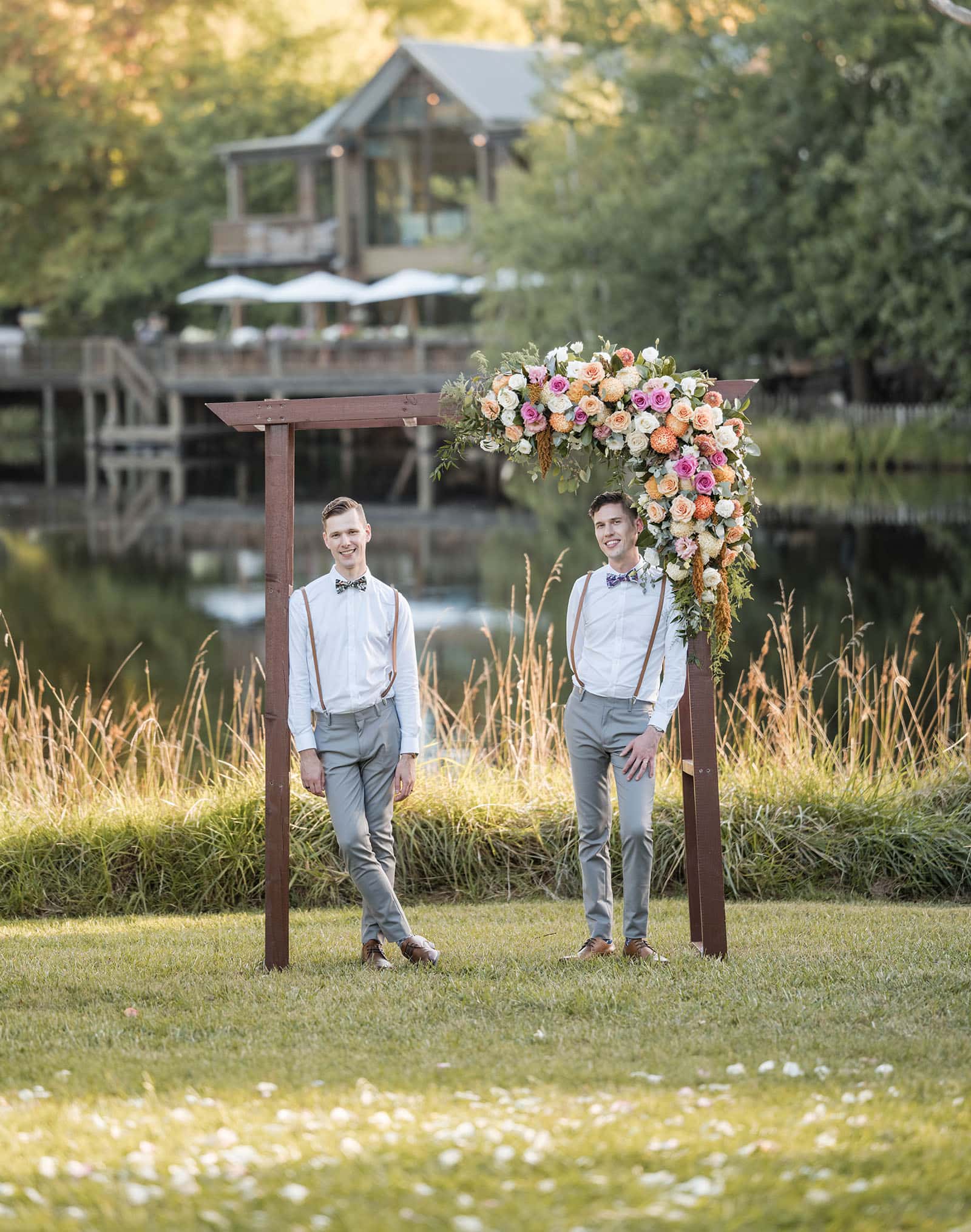 k1 winery wedding - mitch & nick 134 Grooms leaning on arbour