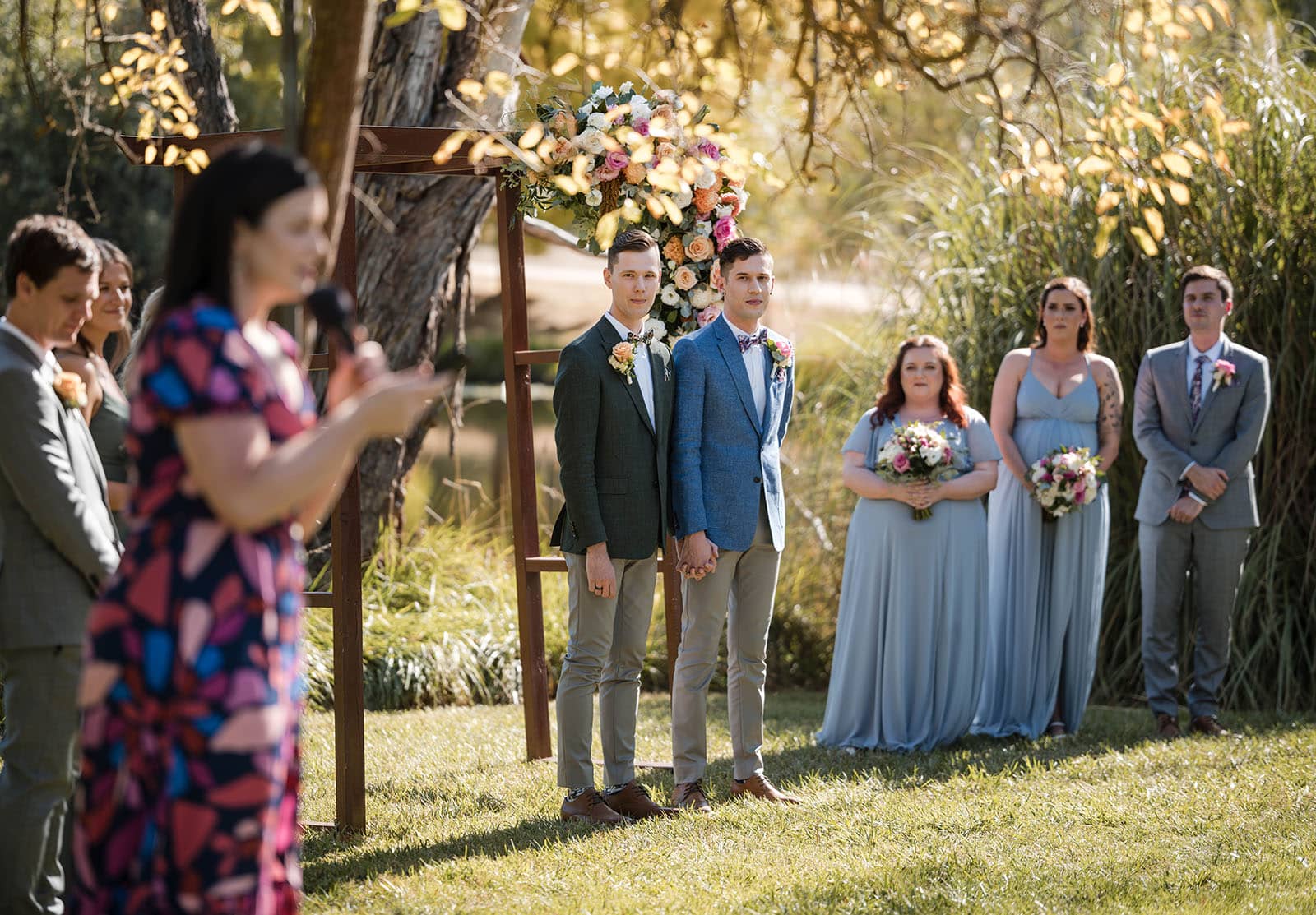 k1 winery wedding - mitch & nick 109 Grooms listening to celebrant during cermeony