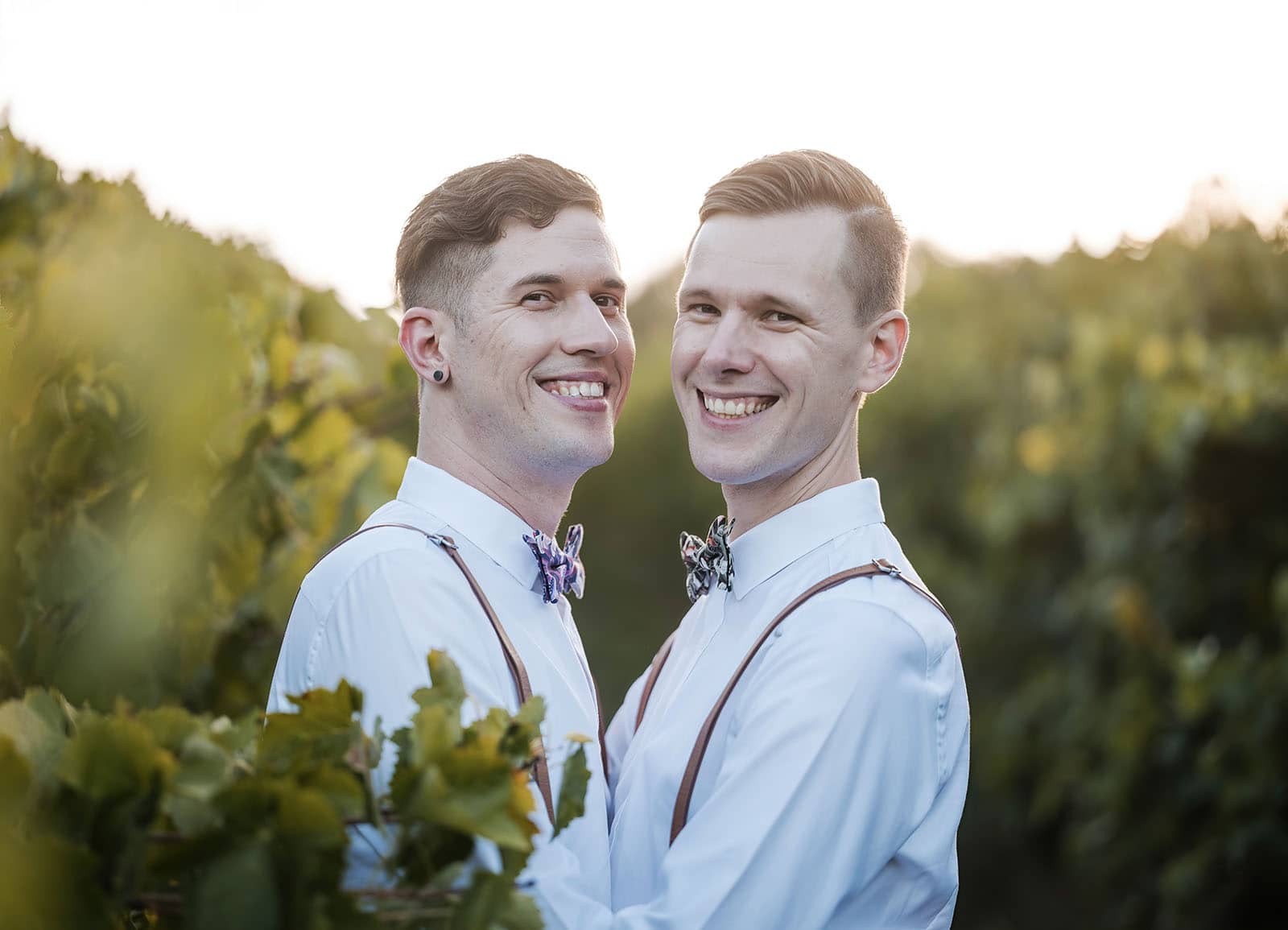 k1 winery wedding - mitch & nick 138 Grooms smiling at camera