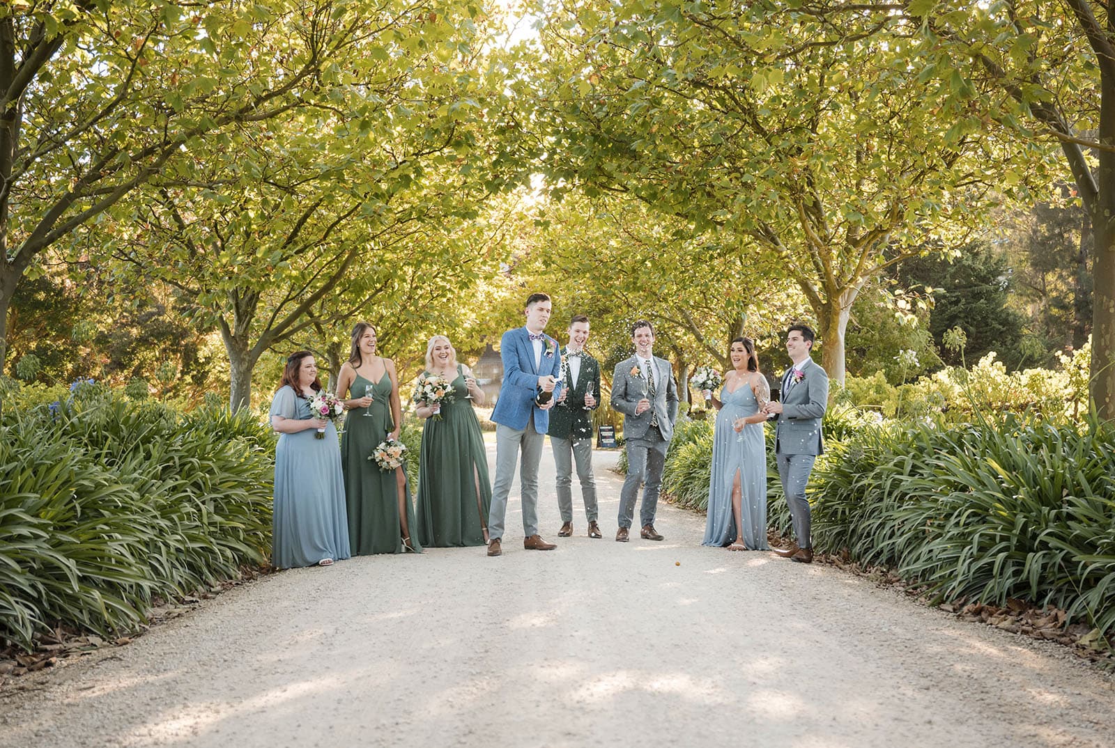 k1 winery wedding - mitch & nick 122 Grooms wedding party wth champagne
