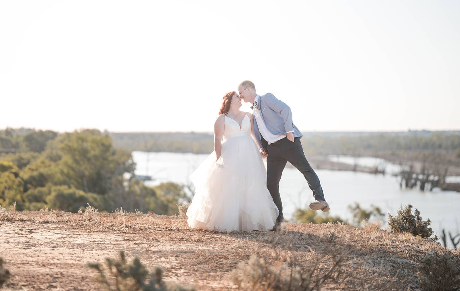 riverland wine centre wedding - lisa & mitch 202 Kiss in the sunlight