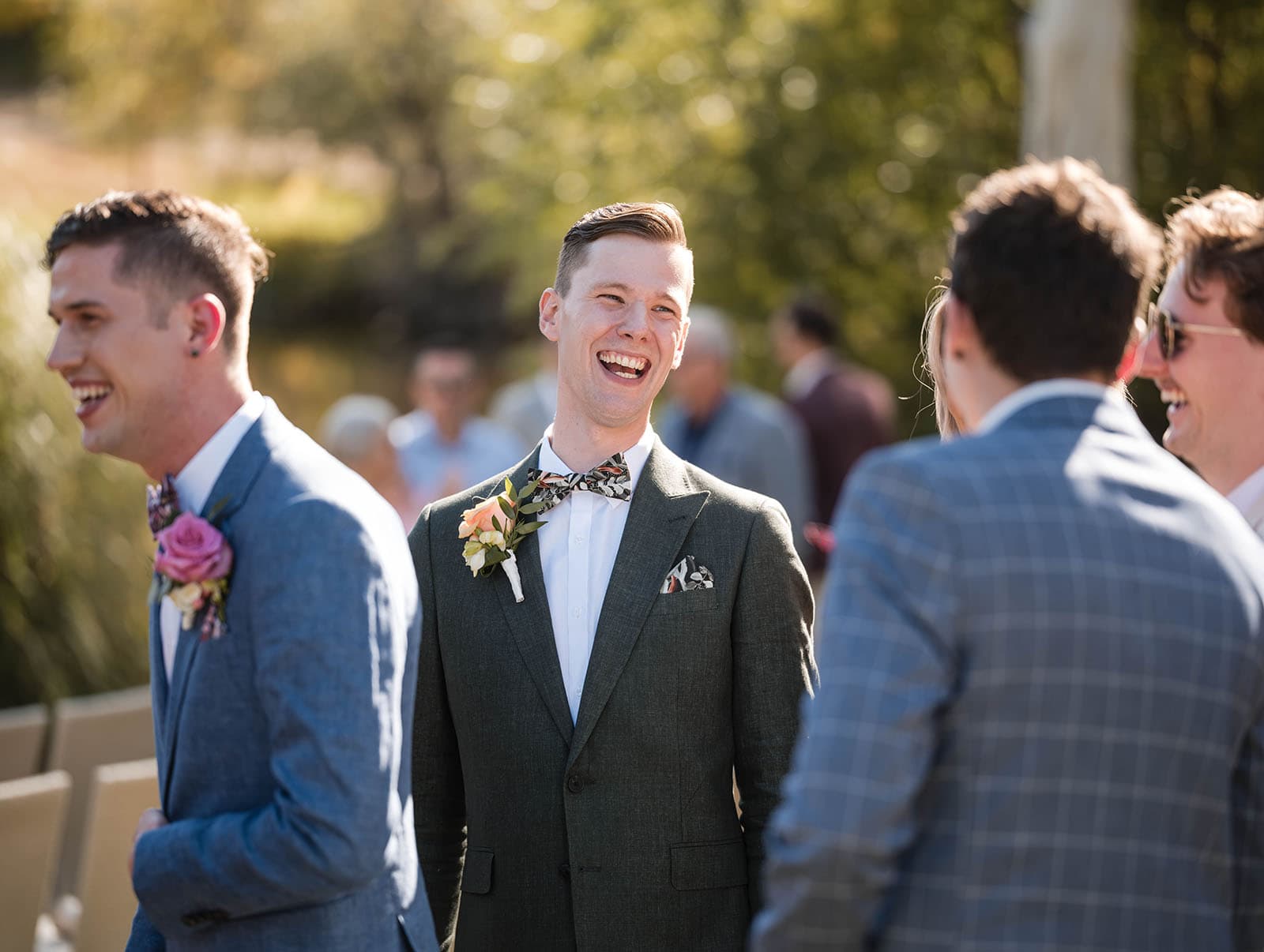 k1 winery wedding - mitch & nick 119 Laughing groom after ceremony