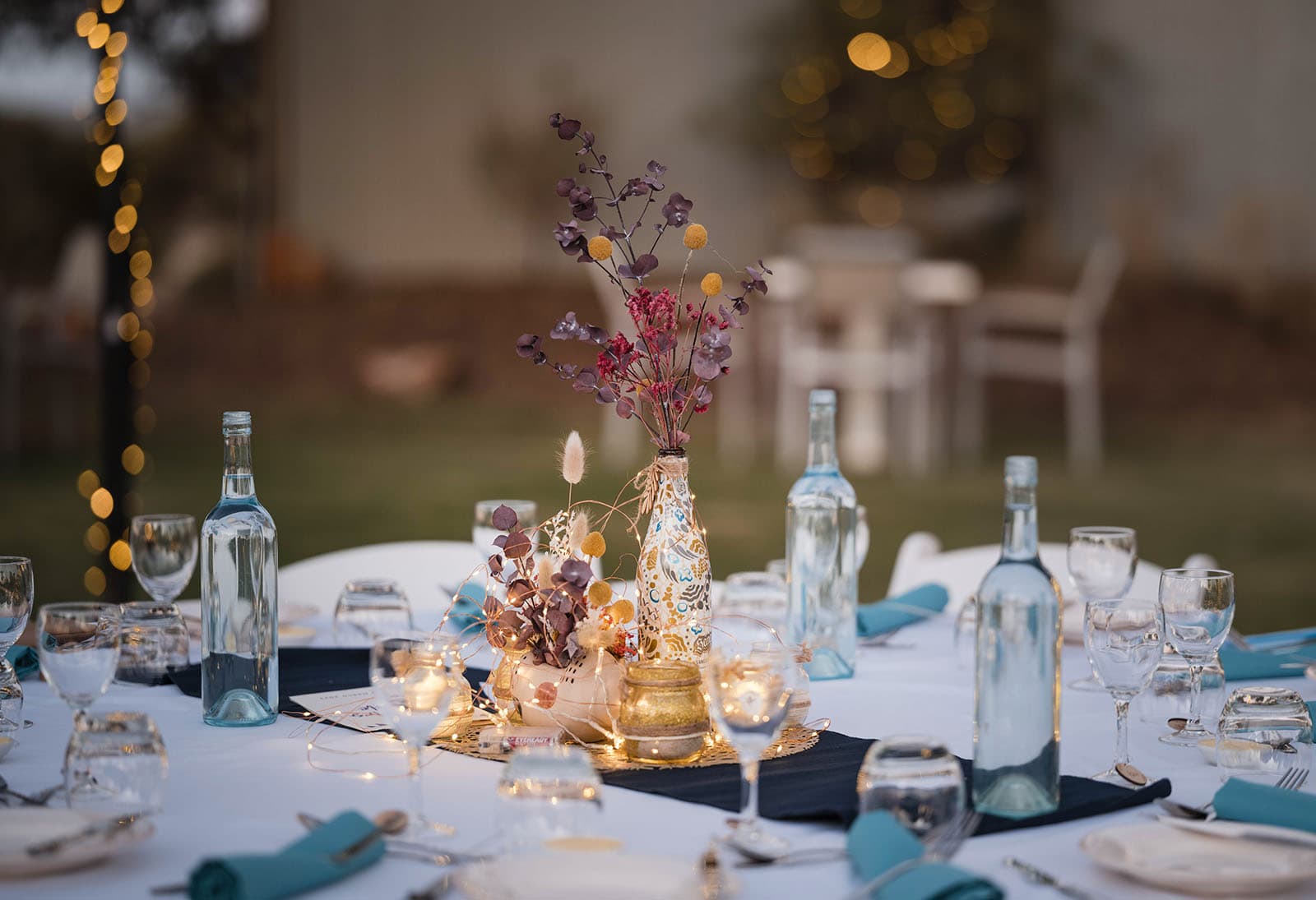 riverland wine centre wedding - lisa & mitch 214 One of the table centerpieces