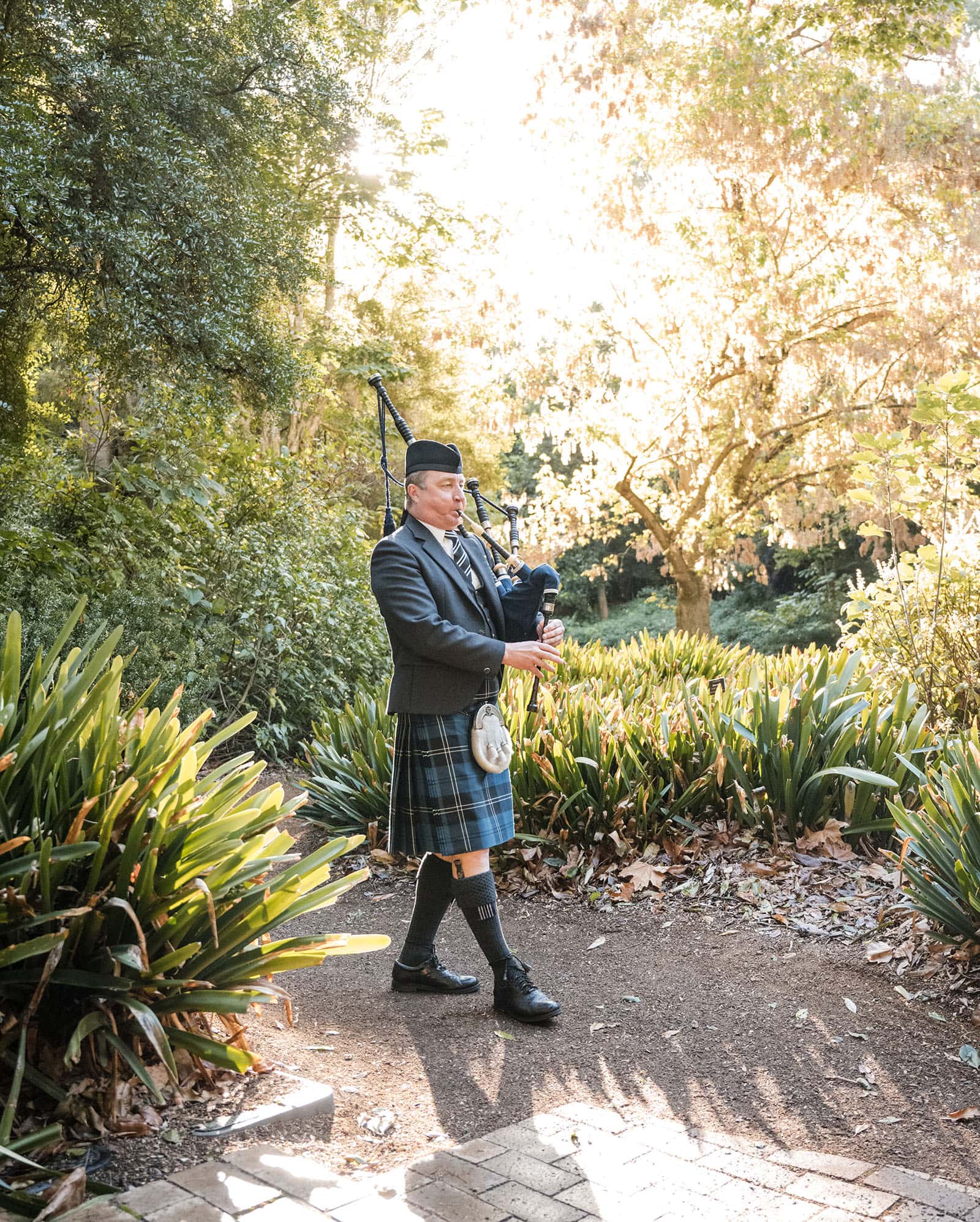 barbershop gazebo wedding, botanic gardens - helen & john 13 Bagpiper walking around Adelaide Botanic Gardens