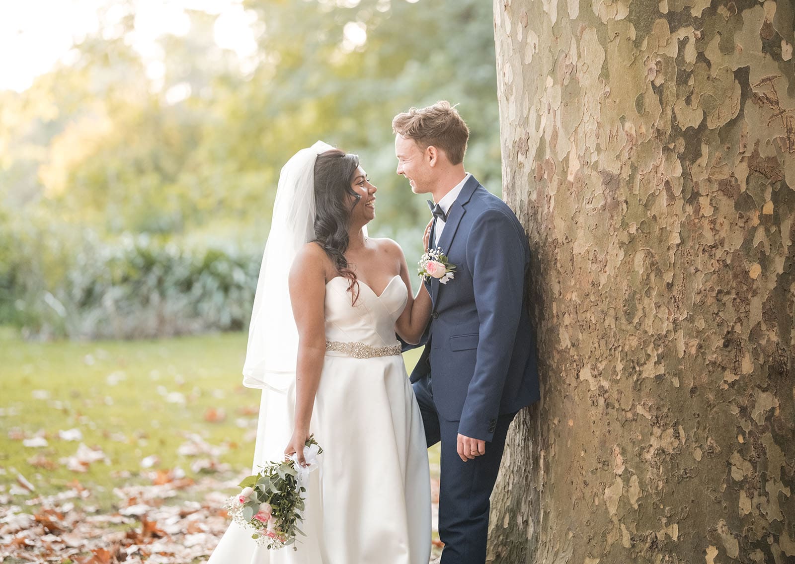 our lady of the rosary church wedding - lorraine & wayne 184 Bridal couple looking at one another near tree