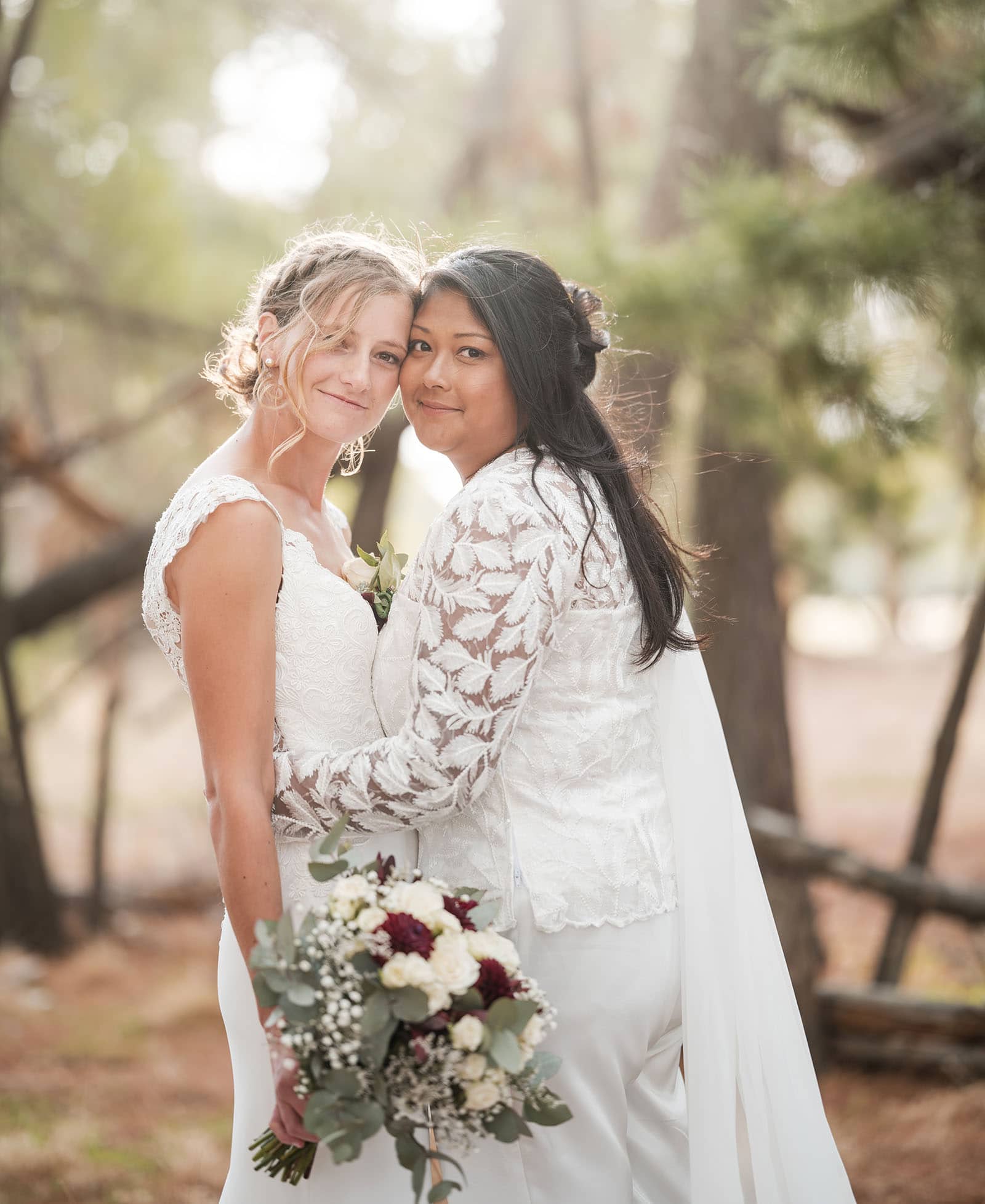 vine shed wedding - kat & katie 235 bridal hugs under sunlight
