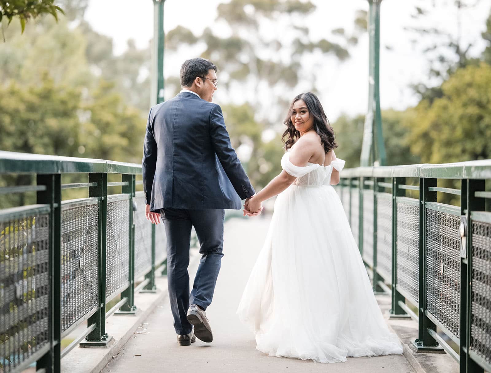 chesser st registration office wedding - khate & angelo 83 Bride and groom corssing Torrens footbridge