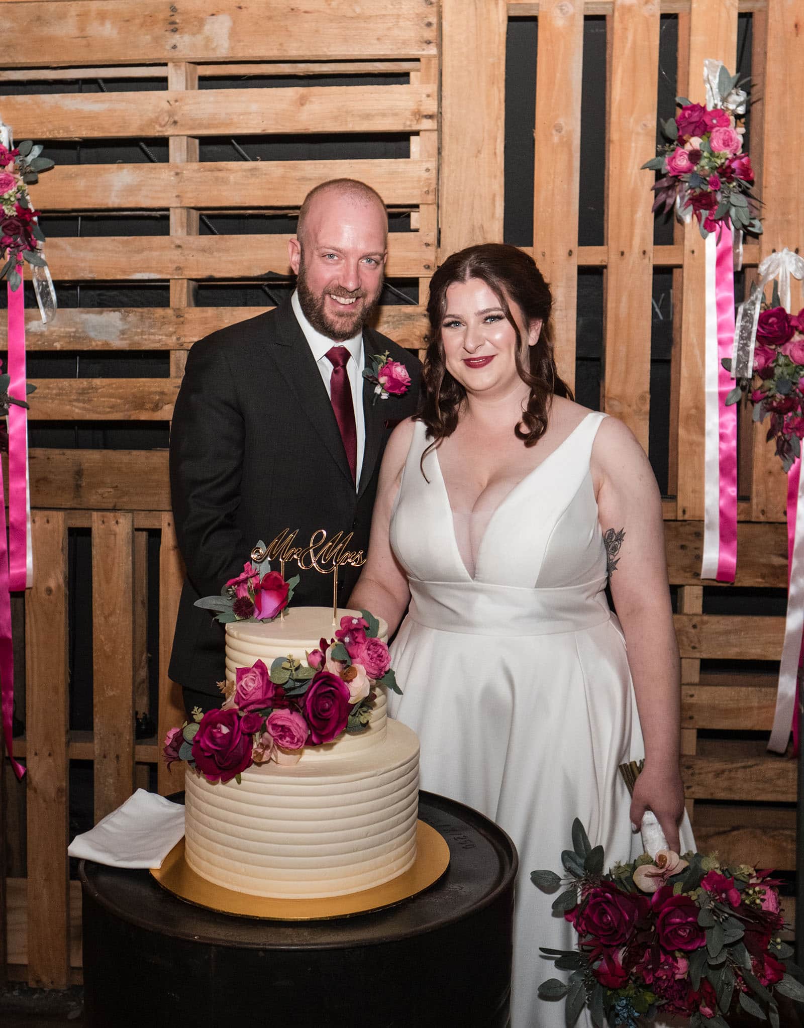 ten22 wedding - julia & daniel 178 bride and groom cutting their cake