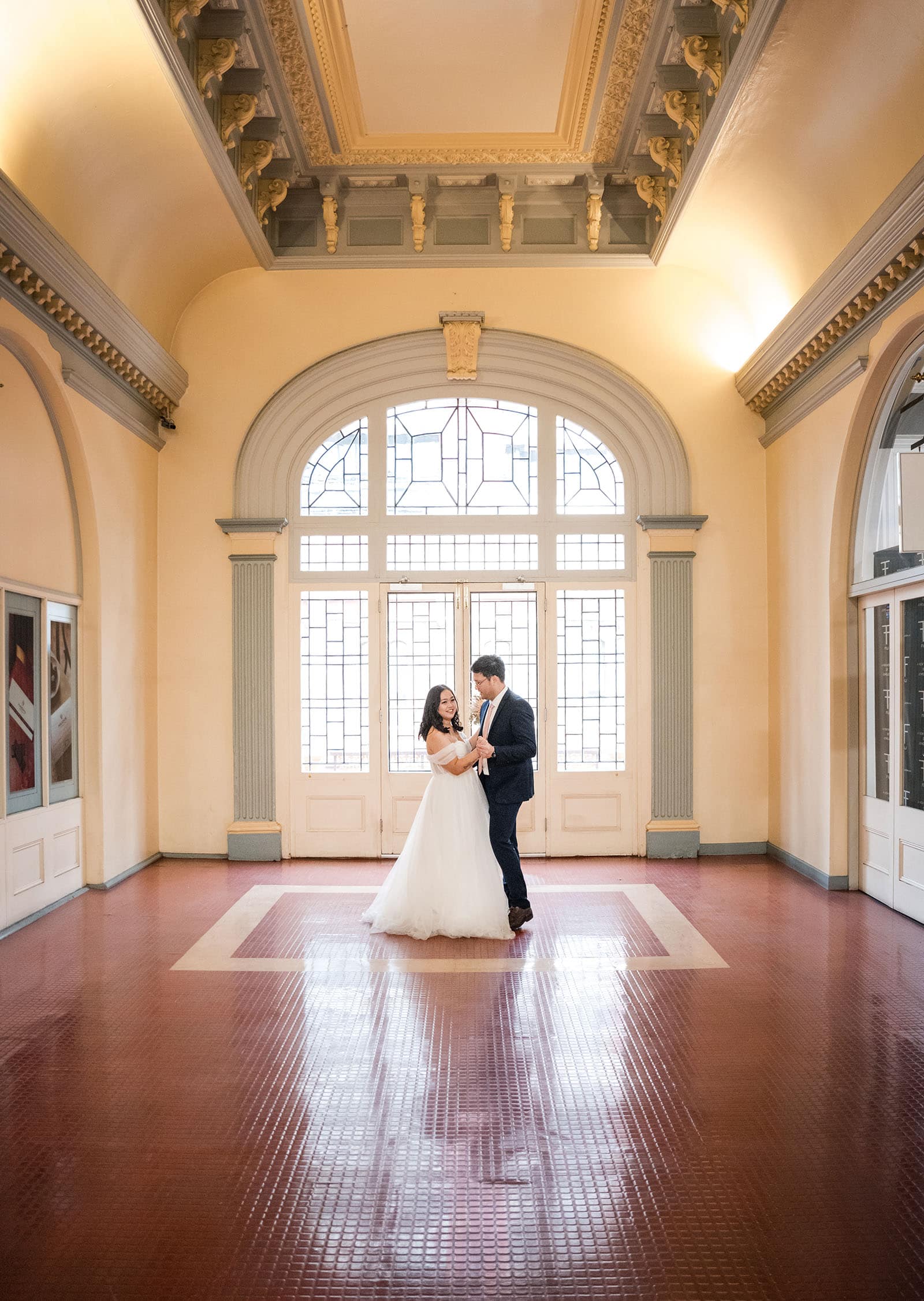 chesser st registration office wedding - khate & angelo 79 Bride and groom dacning in the Adelaide Arcade