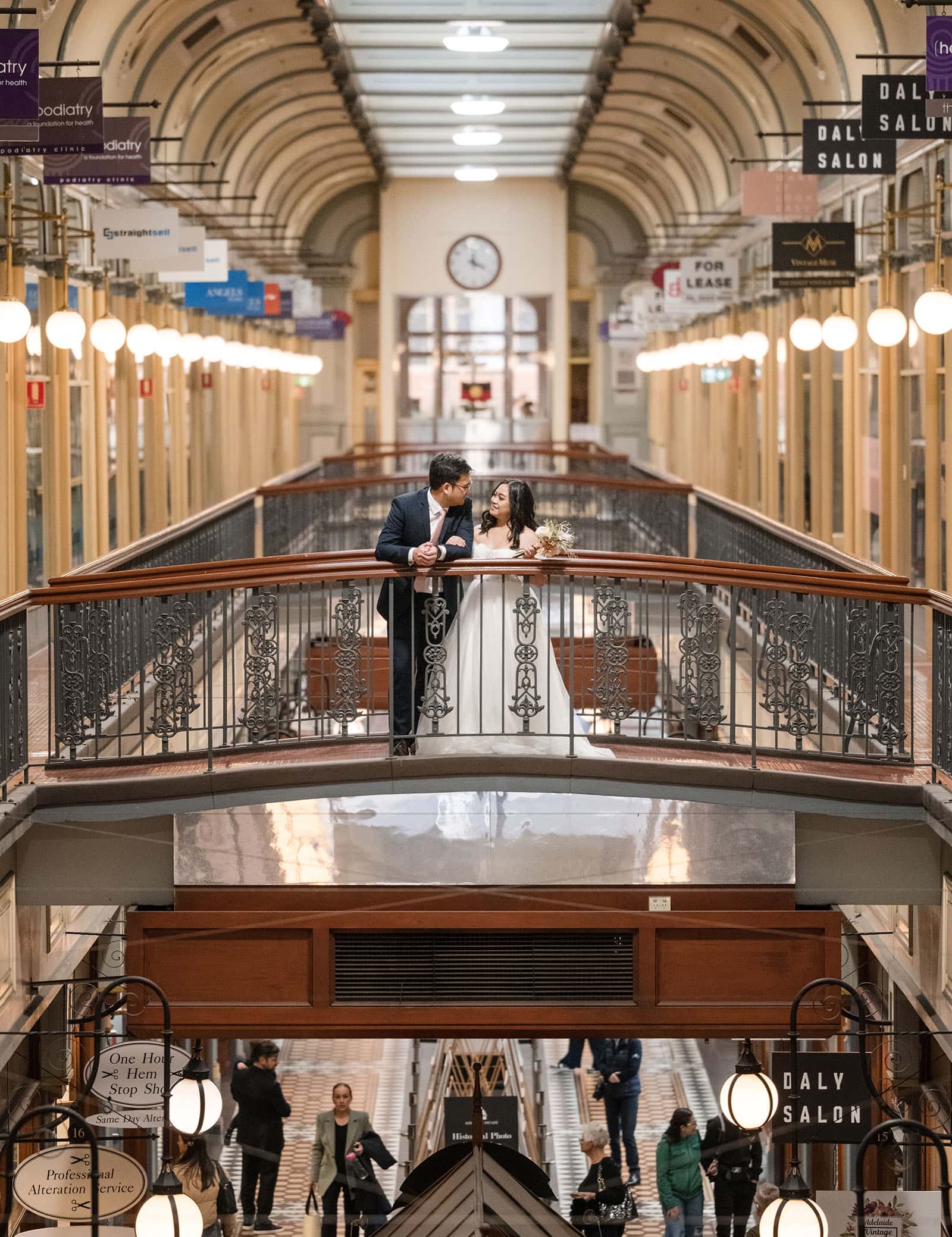 chesser st registration office wedding - khate & angelo 77 Bride and groom on balcony in the Adelaide Arcade