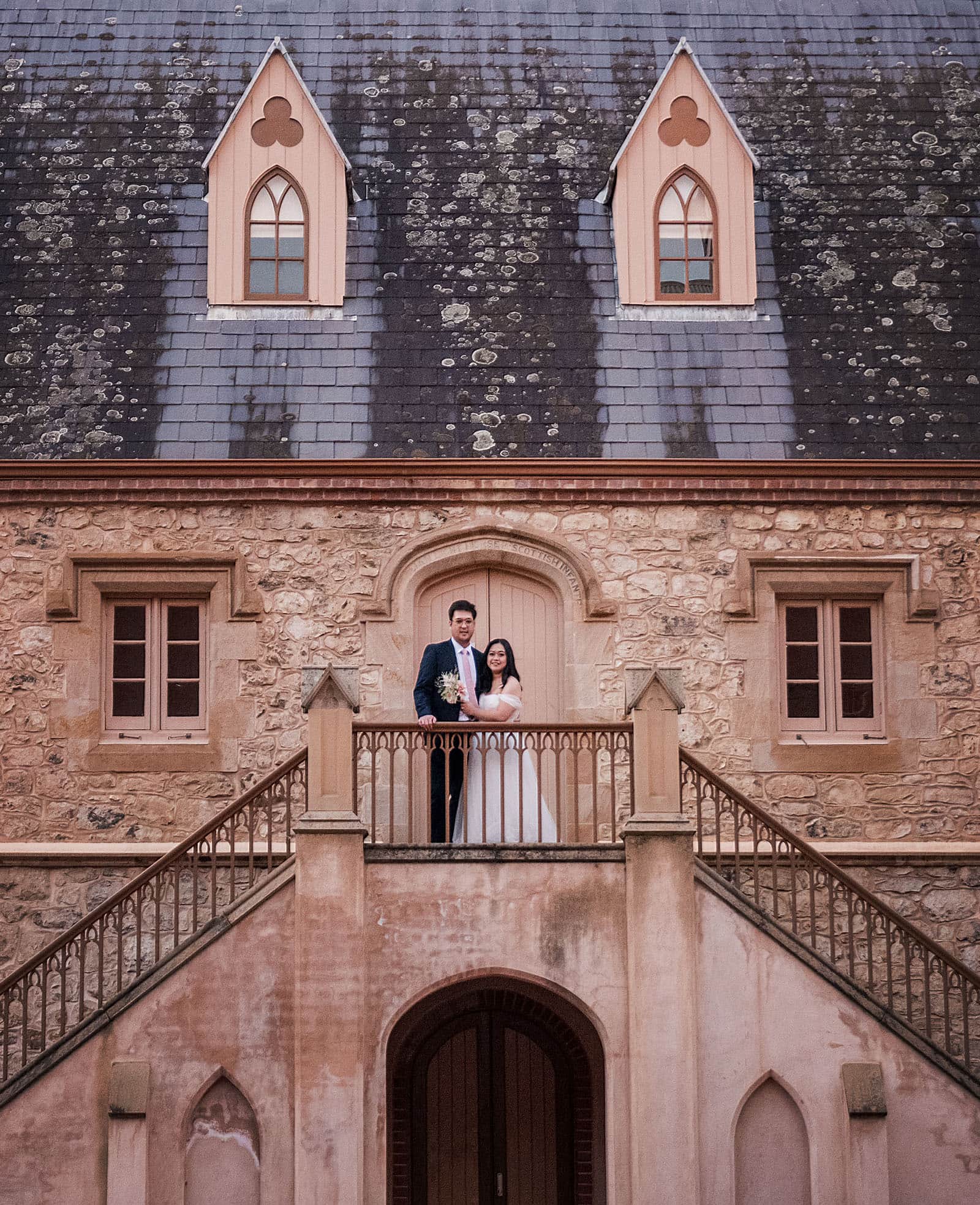 chesser st registration office wedding - khate & angelo 94 bride and groom on the Adelaide Police Barracks balcony