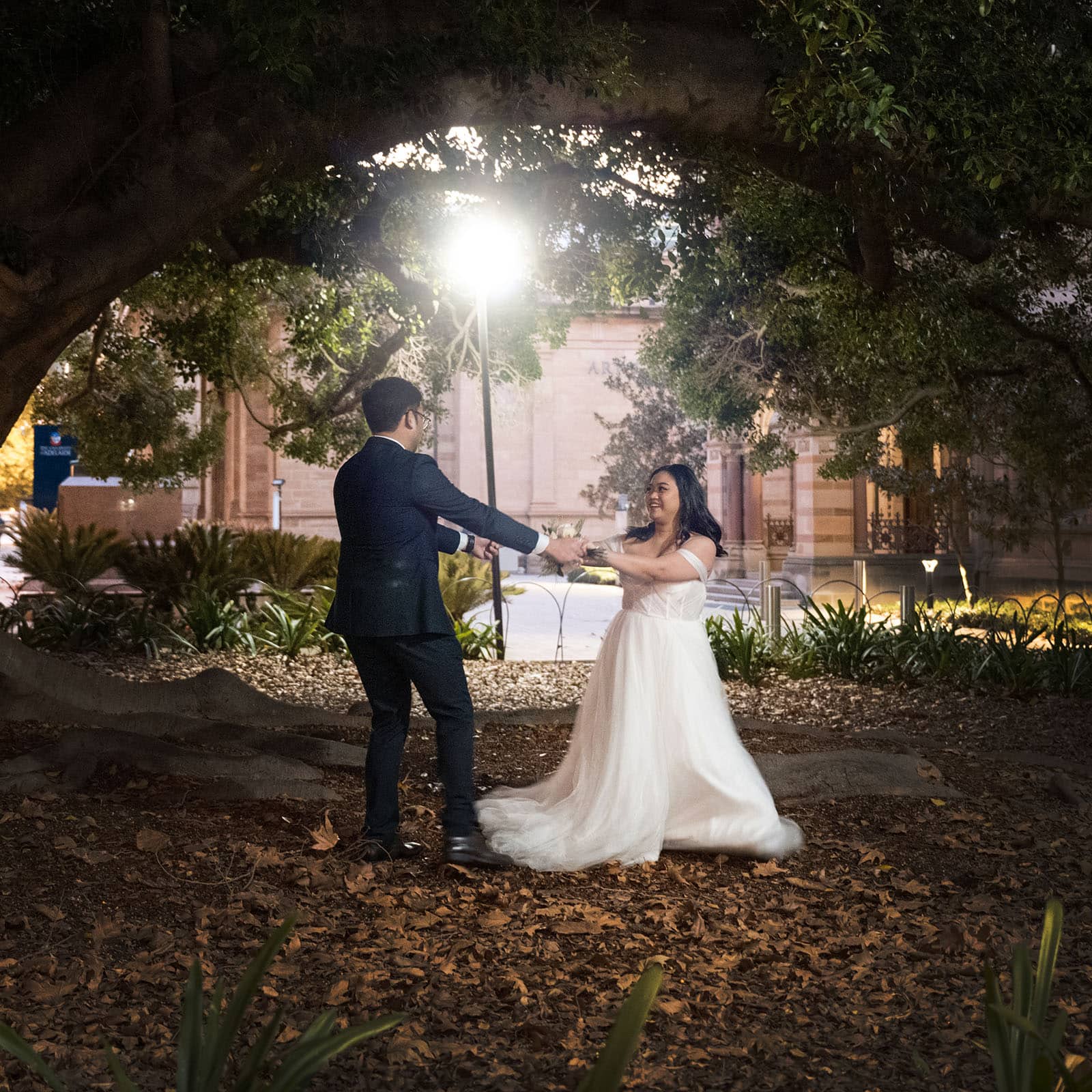 chesser st registration office wedding - khate & angelo 102 bride and groom swining under street light