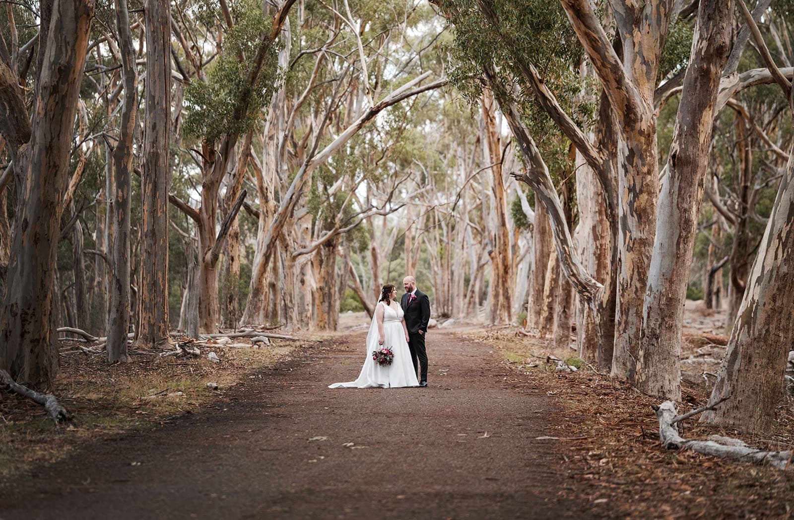 ten22 wedding - julia & daniel 169 Bride and groom under canopy of gum trees
