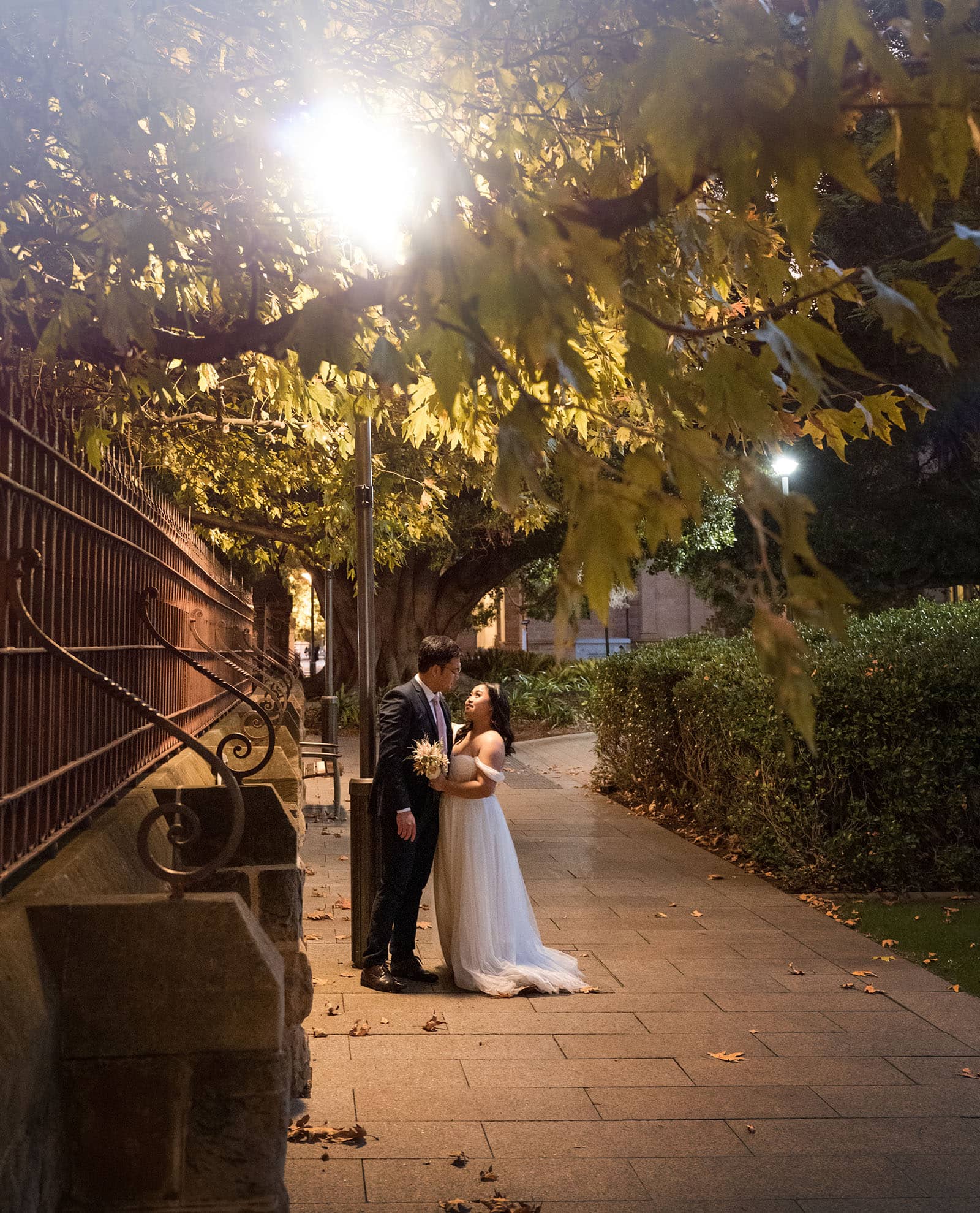 chesser st registration office wedding - khate & angelo 105 Bride and groom under street light