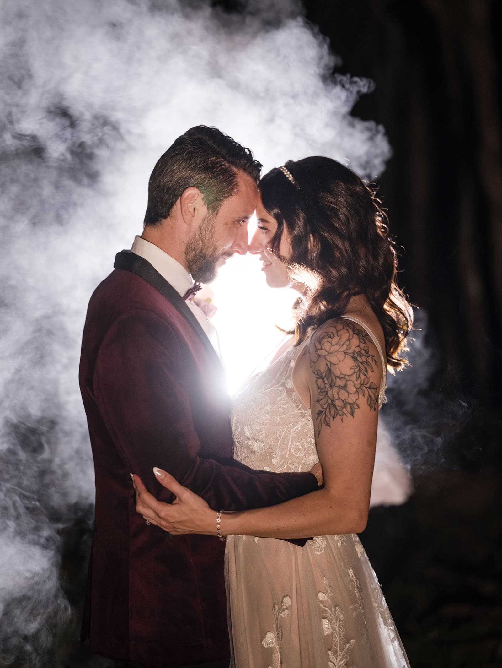 sneakys wedding - ash & michael 108 Bride and groom with smoke in background
