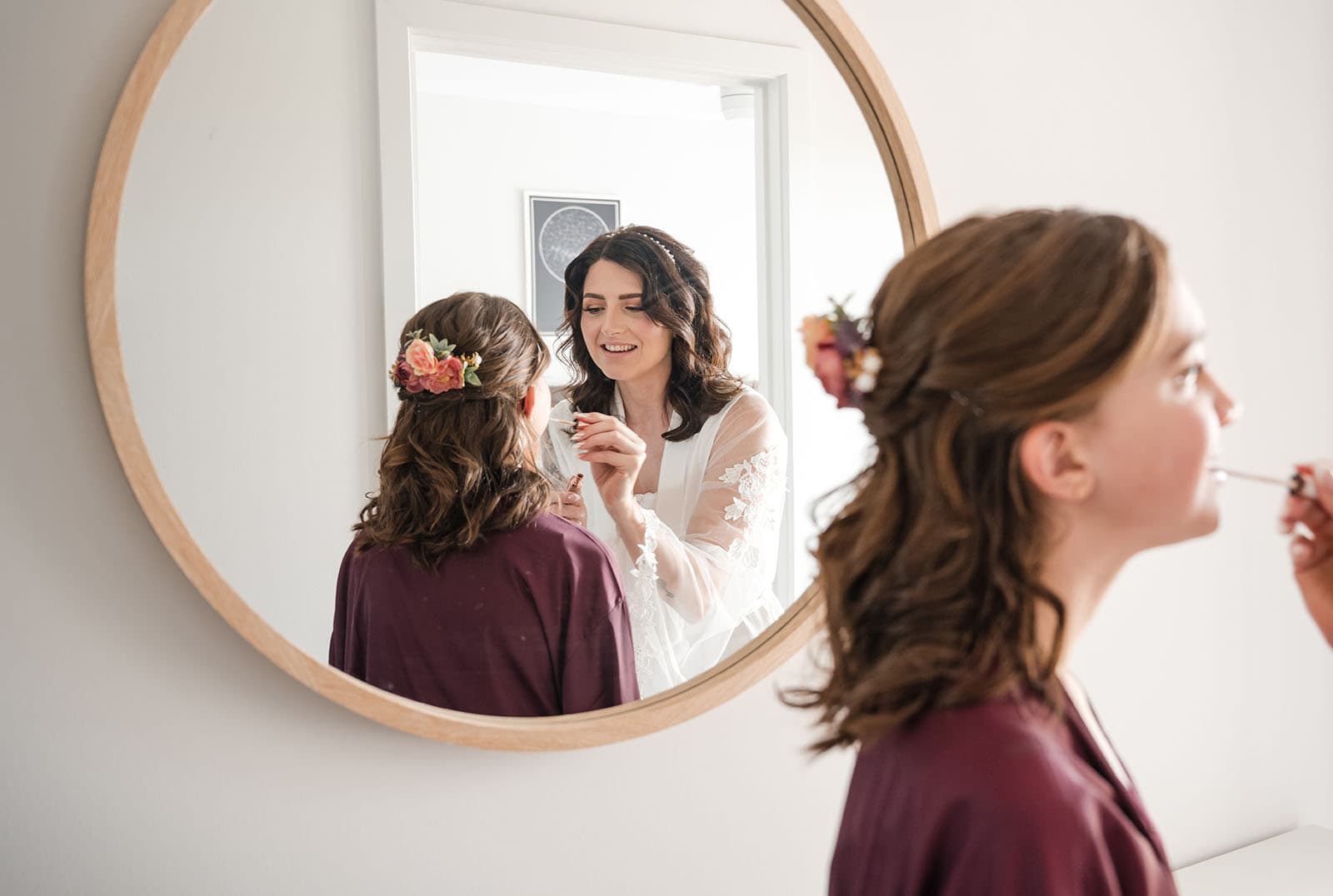 sneakys wedding - ash & michael 61 Bride and junior bridesmaid in mirror