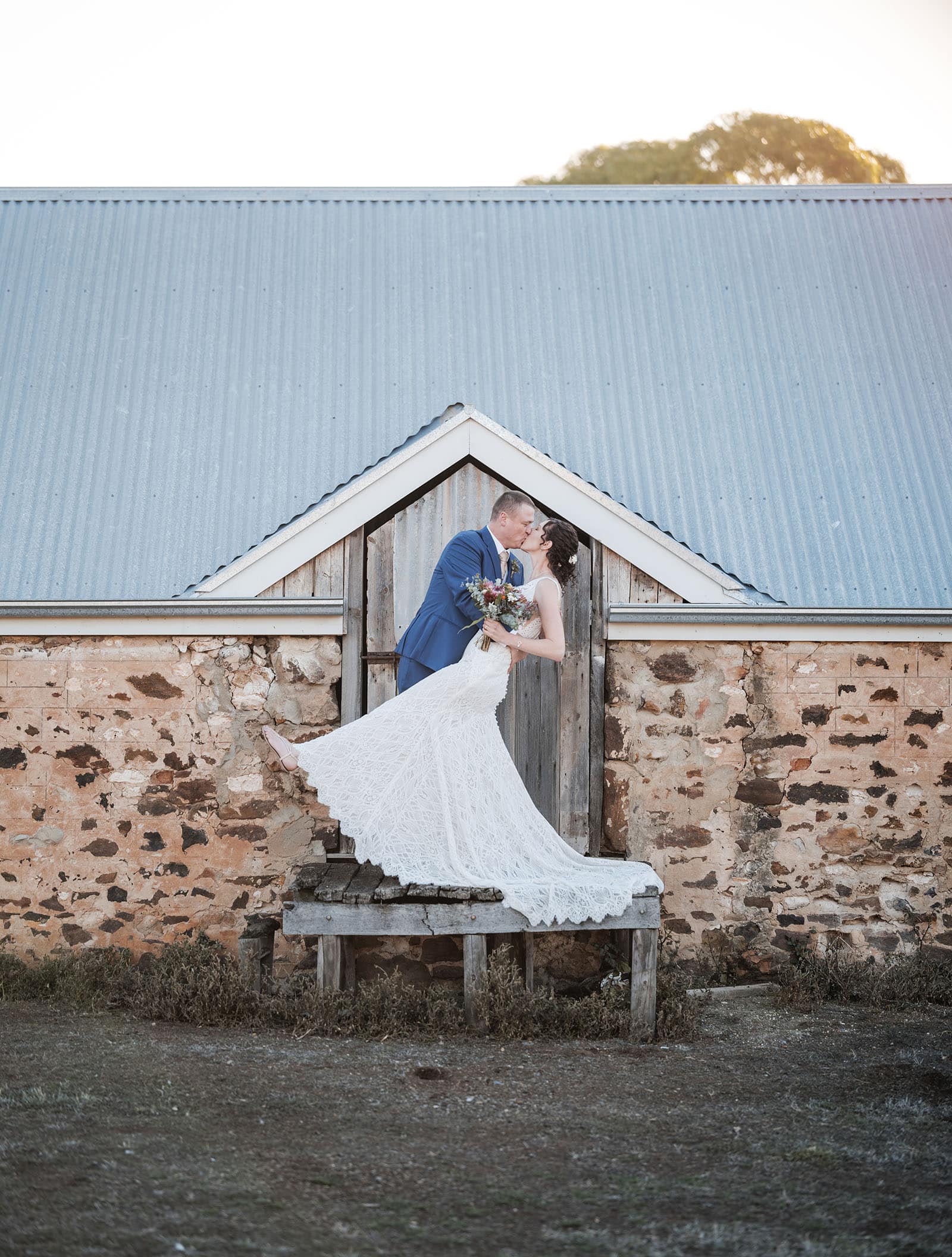 white hill estate wedding - catherine & sean 306 Bride dips in front of stables