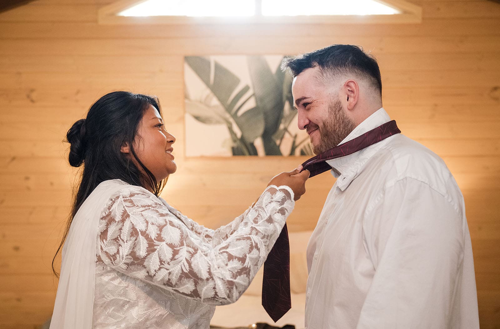 vine shed wedding - kat & katie 194 Bride helping bridesman with tie