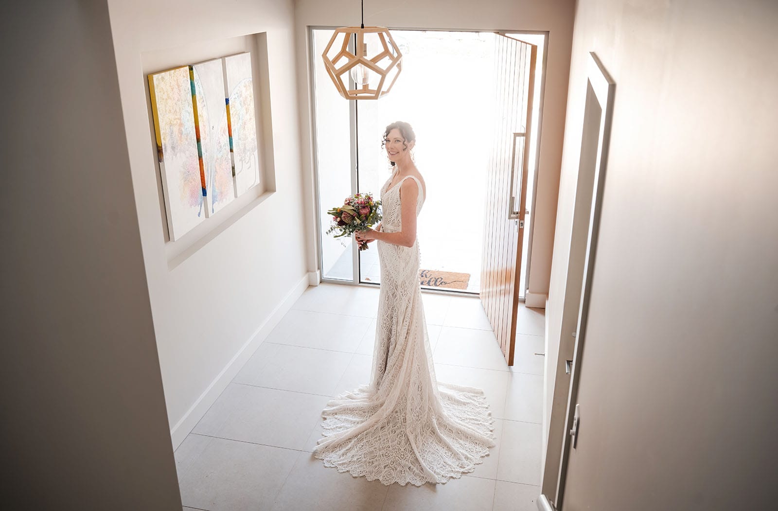 white hill estate wedding - catherine & sean 282 Bride in wedding dress in front door