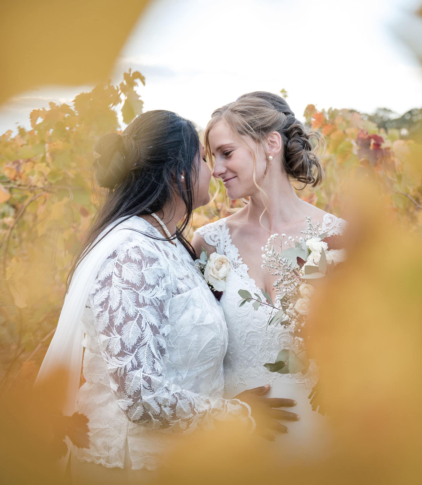vine shed wedding - kat & katie 245 bride smiling through vines