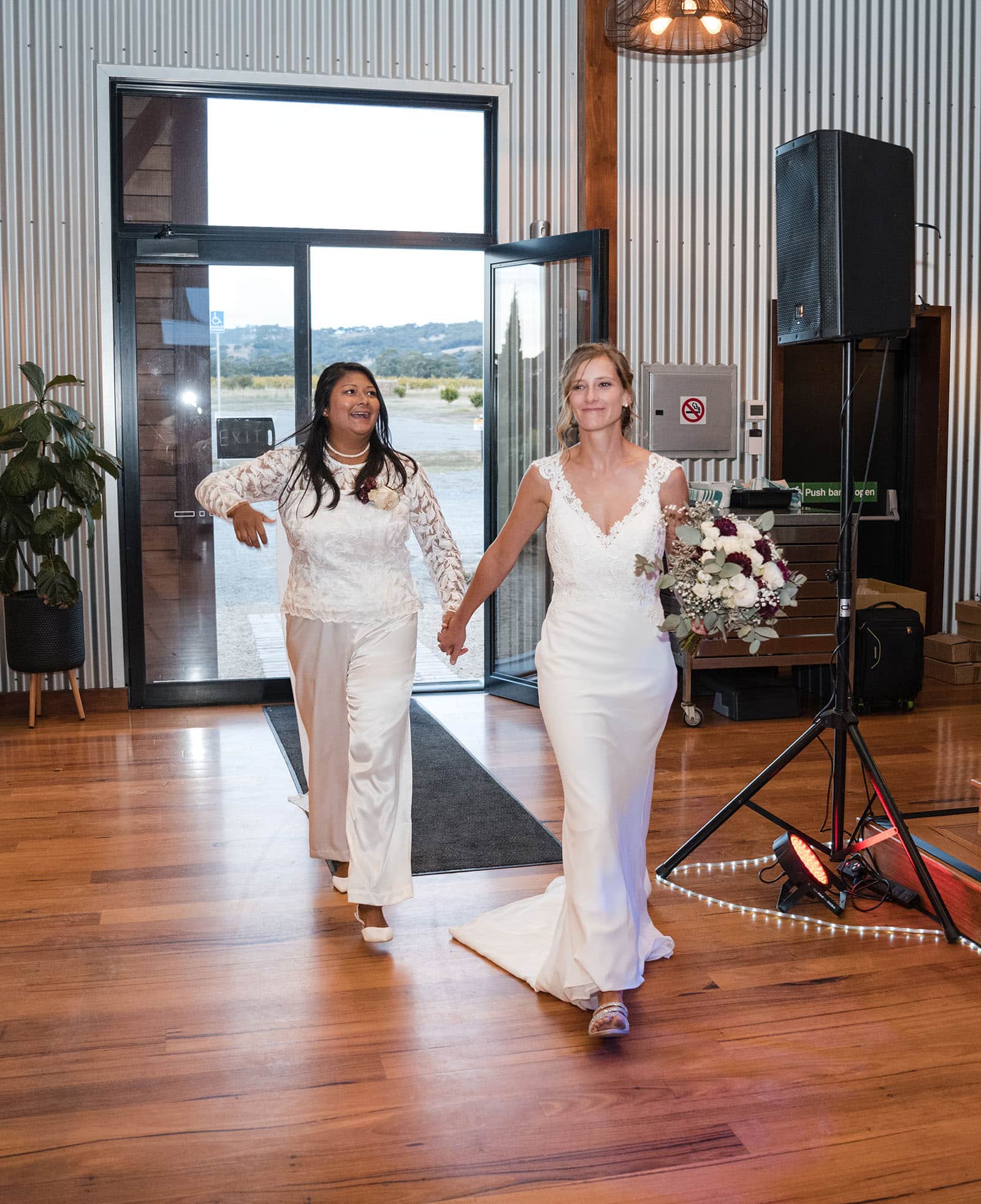 vine shed wedding - kat & katie 249 Brides entering Vine Shed wedding reception