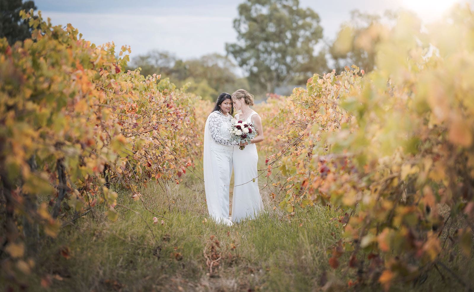 vine shed wedding - kat & katie 244 Brides standing in vineyard