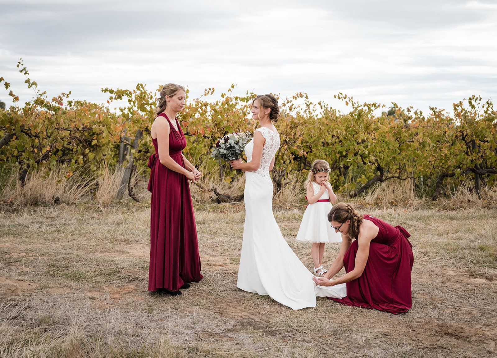 vine shed wedding - kat & katie 210 Bridesmaids fluffing train