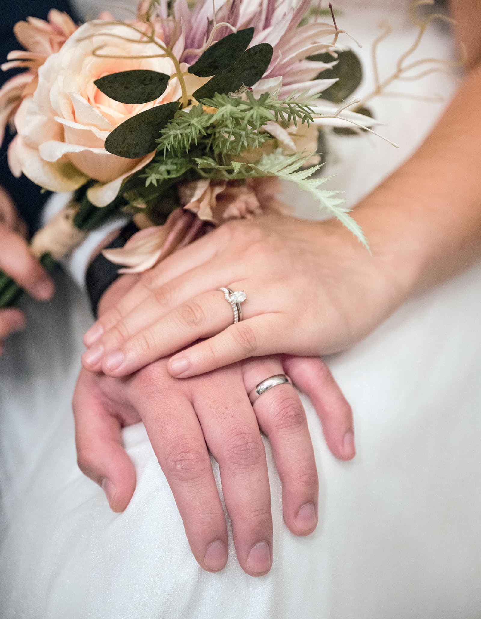 chesser st registration office wedding - khate & angelo 72 Close up of wedding rings on hands