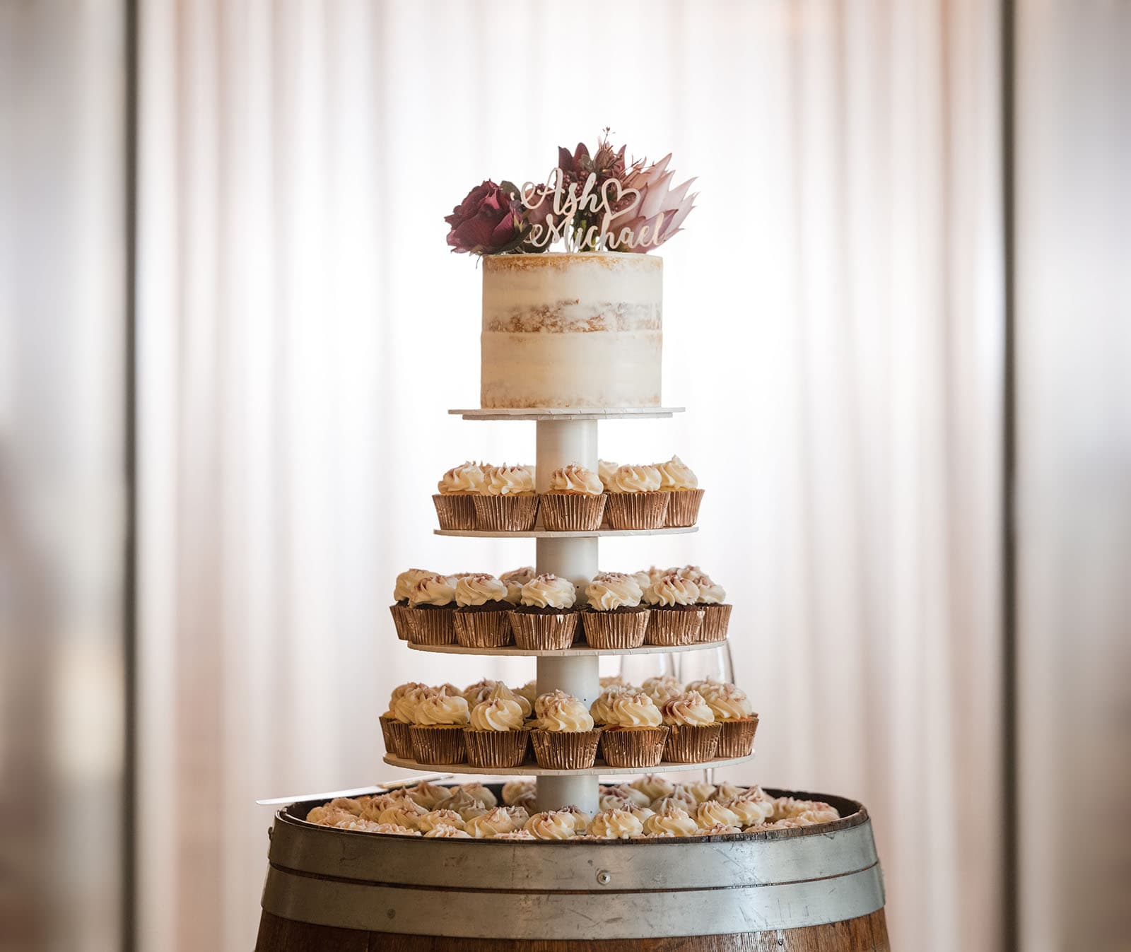 sneakys wedding - ash & michael 109 cup cake wedding cake in light