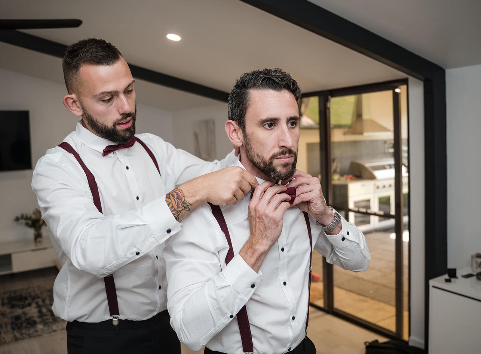 sneakys wedding - ash & michael 50 Groom getting help from best man