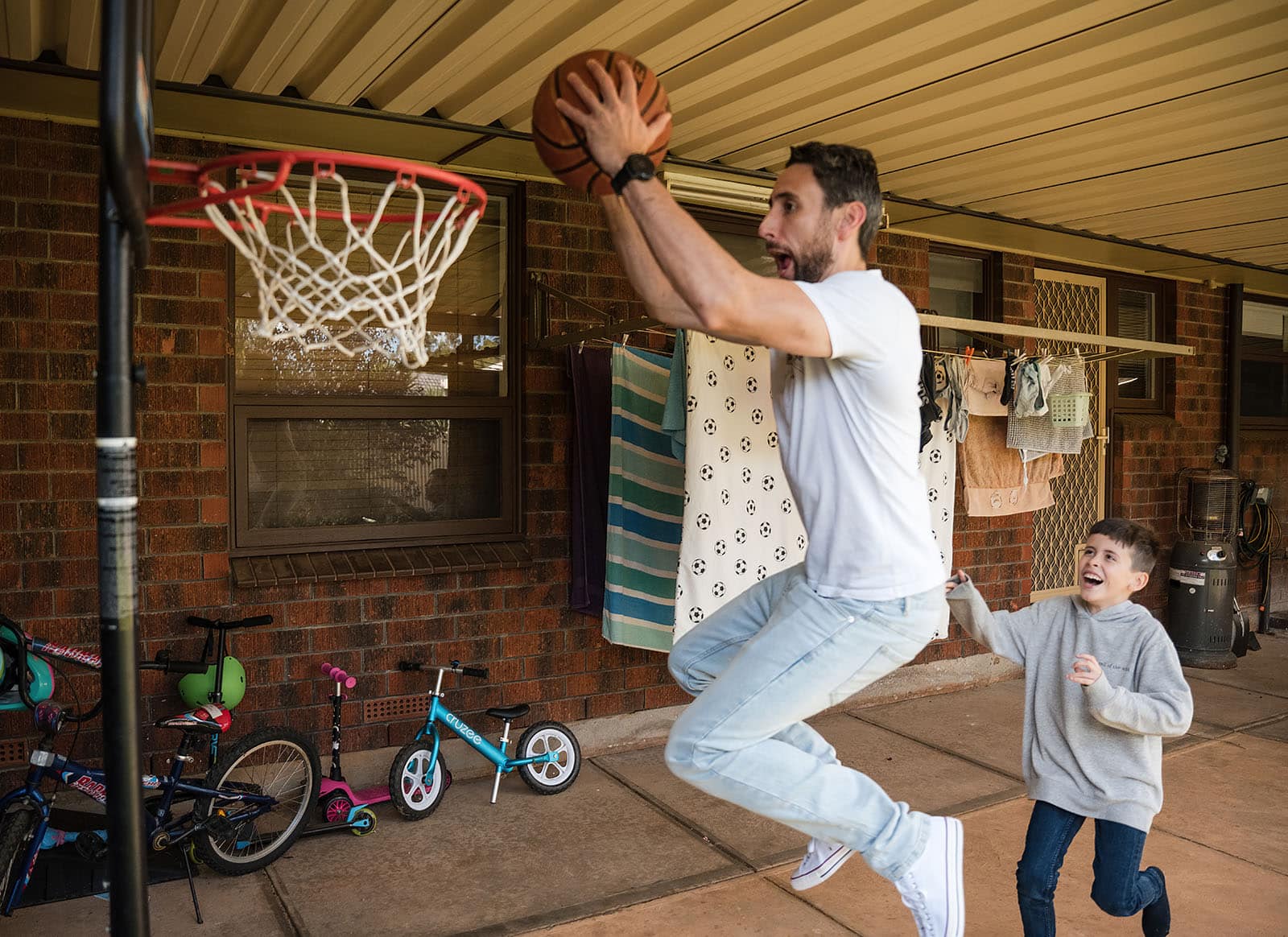 sneakys wedding - ash & michael 42 Groom playing basketball before getting ready