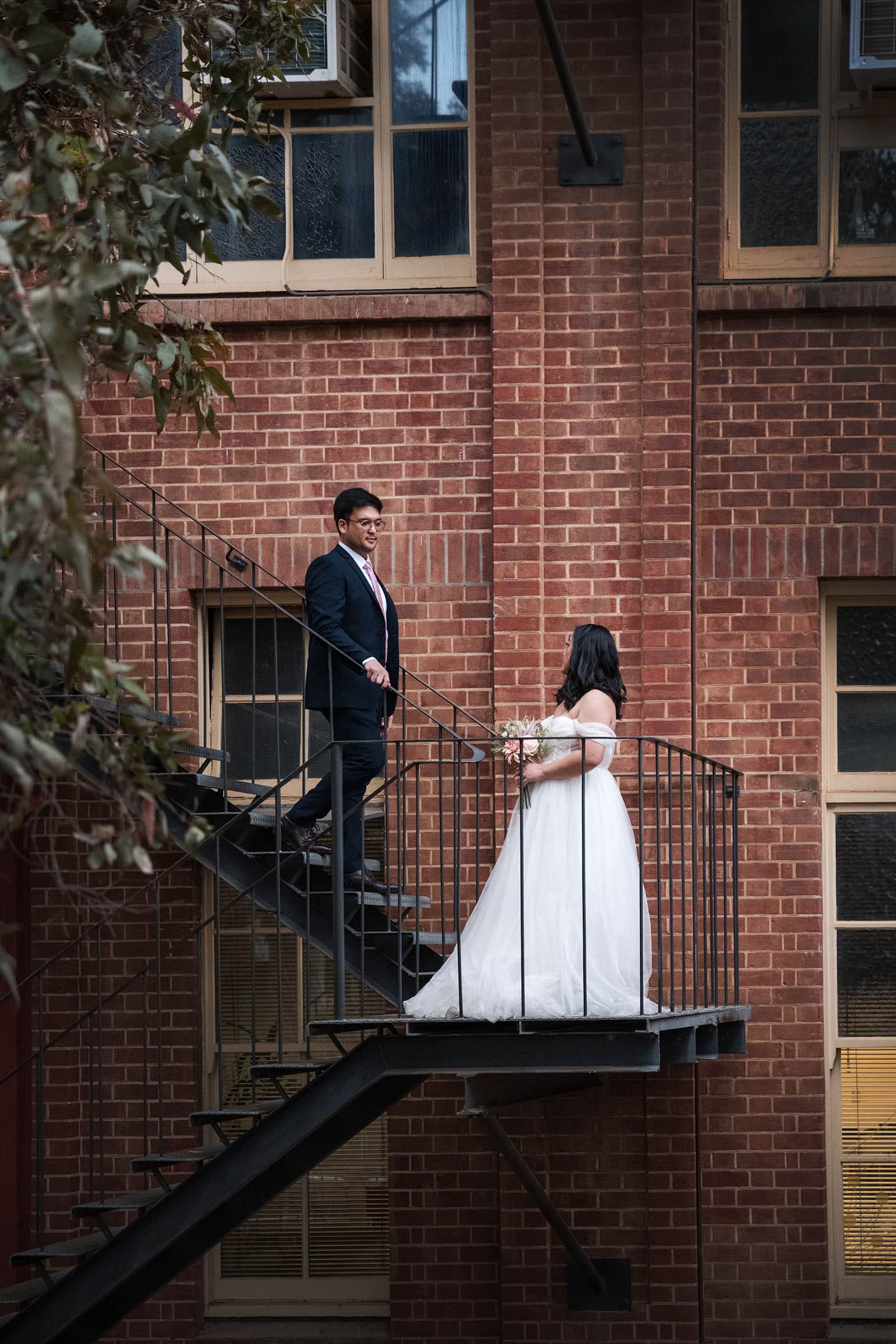 chesser st registration office wedding - khate & angelo 91 Groom walking down stairs to meet bride